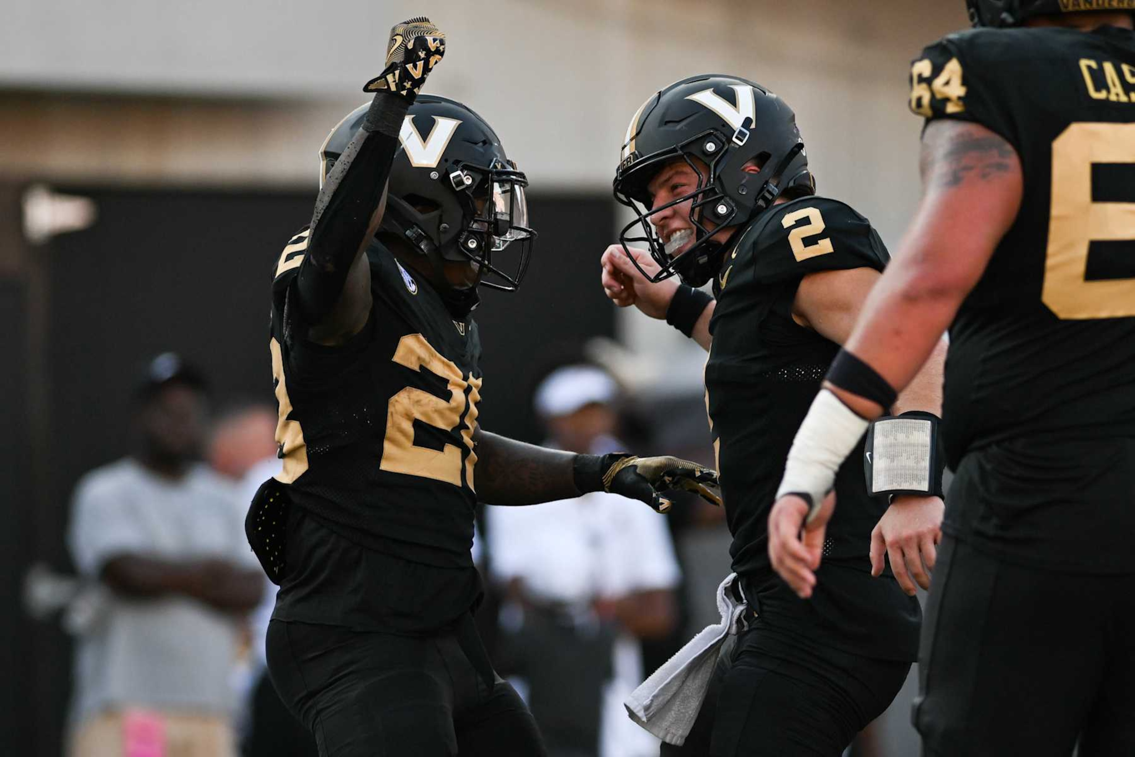 NASHVILLE, TENNESSEE - OCTOBER 5: Diego Pavia #2 and Sedrick Alexander #28 of the Vanderbilt Commodores celebrate a touchdown against Alabama Crimson Tide in the first half at FirstBank Stadium on October 5, 2024 in Nashville, Tennessee. (Photo by Carly Mackler/Getty Images) NASHVILLE, TENNESSEE - OCTOBER 5: Diego Pavia #2 and Sedrick Alexander #28 of the Vanderbilt Commodores celebrate a touchdown against Alabama Crimson Tide in the first half at FirstBank Stadium on October 5, 2024 in Nashville, Tennessee. (Photo by Carly Mackler/Getty Images)