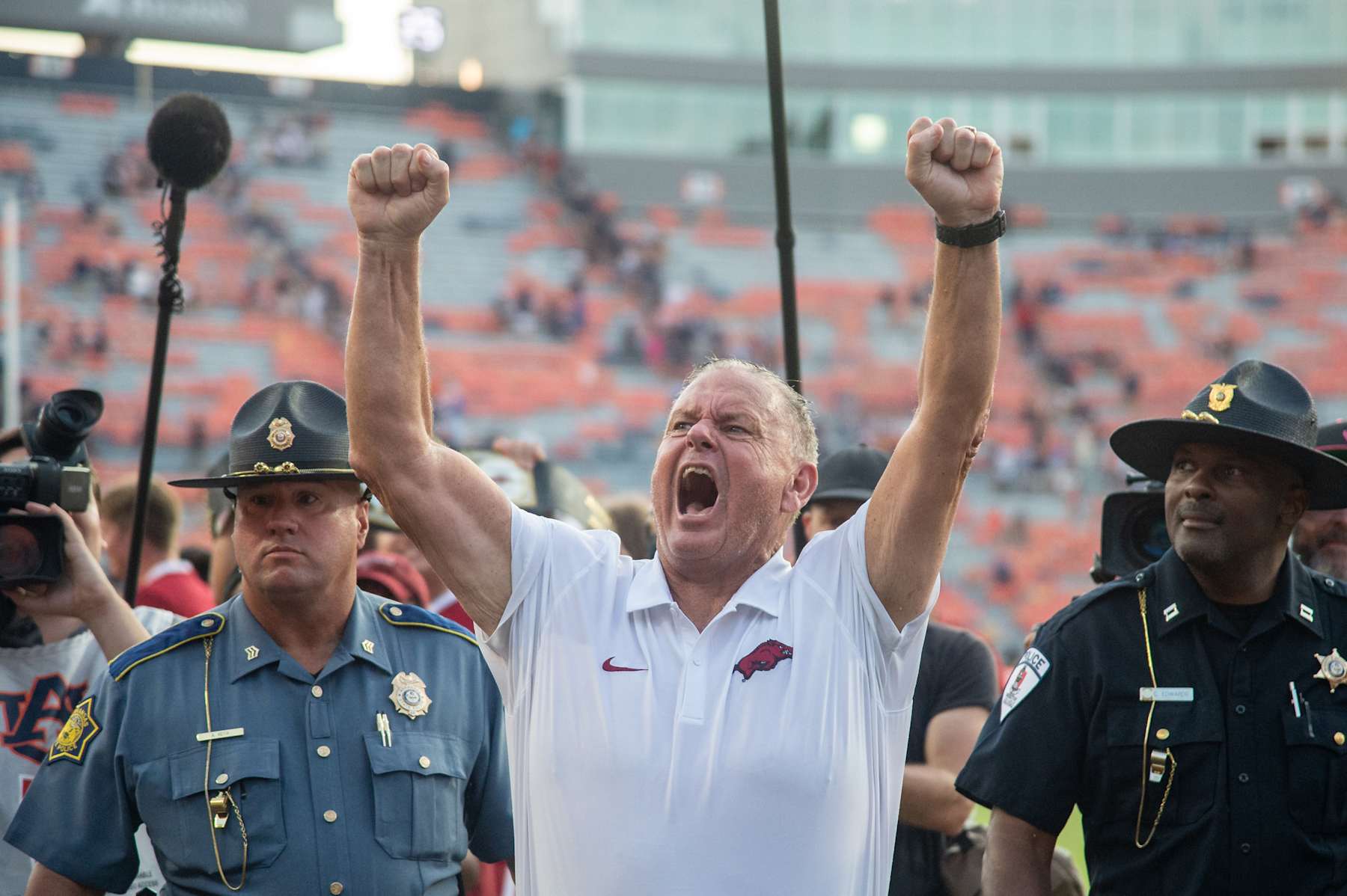 AUBURN, ALABAMA - SEPTEMBER 21: Head coach Sam Pittman of the Arkansas Razorbacks celebrates after defeating the Auburn Tigers at Jordan-Hare Stadium on September 21, 2024 in Auburn, Alabama. (Photo by Michael Chang/Getty Images)