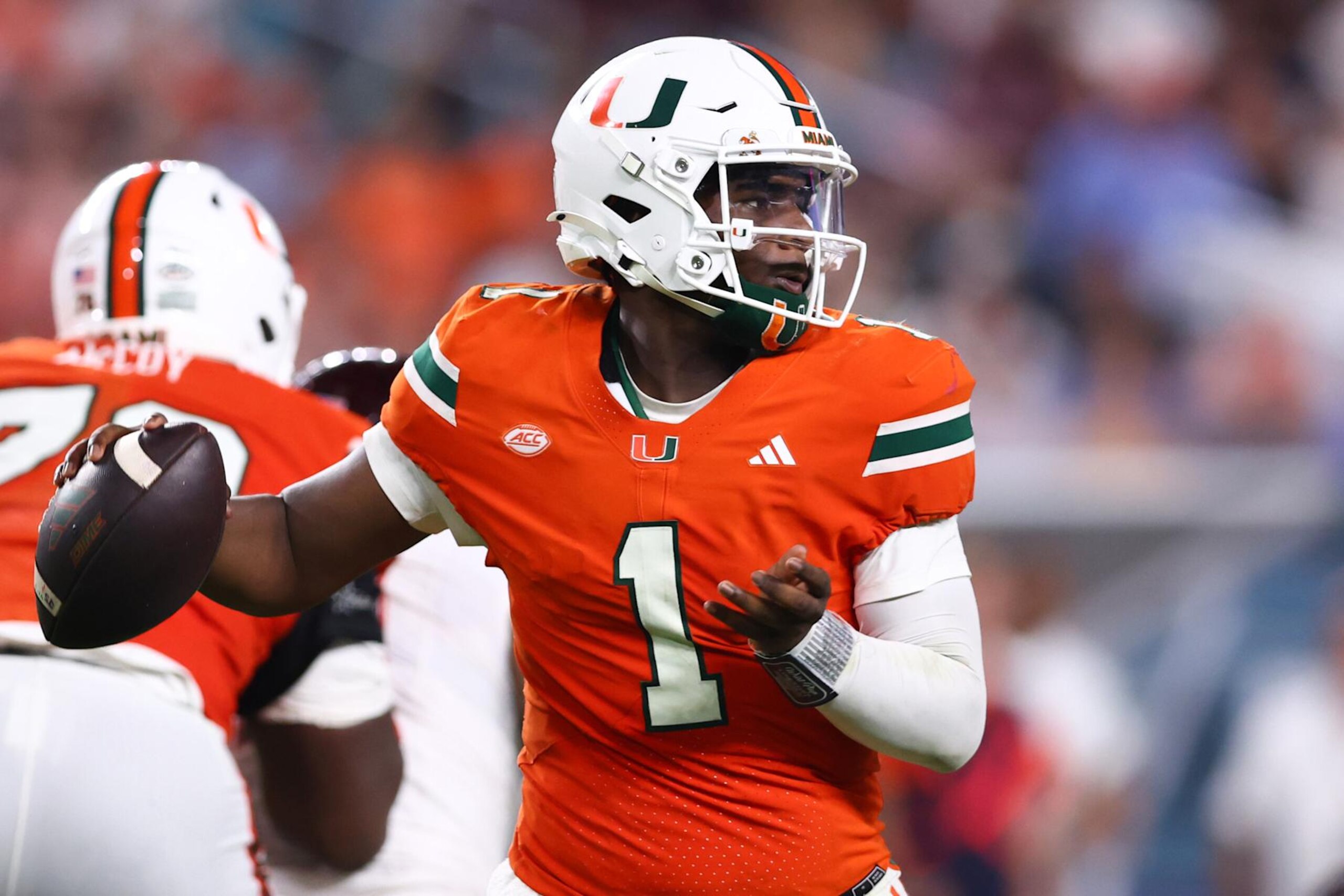 MIAMI GARDENS, FLORIDA - SEPTEMBER 27: Cam Ward #1 of the Miami Hurricanes throws a pass against the Virginia Tech Hokies during the second half of the game at Hard Rock Stadium on September 27, 2024 in Miami Gardens, Florida. (Photo by Megan Briggs/Getty Images) MIAMI GARDENS, FLORIDA - SEPTEMBER 27: Cam Ward #1 of the Miami Hurricanes throws a pass against the Virginia Tech Hokies during the second half of the game at Hard Rock Stadium on September 27, 2024 in Miami Gardens, Florida. (Photo by Megan Briggs/Getty Images)