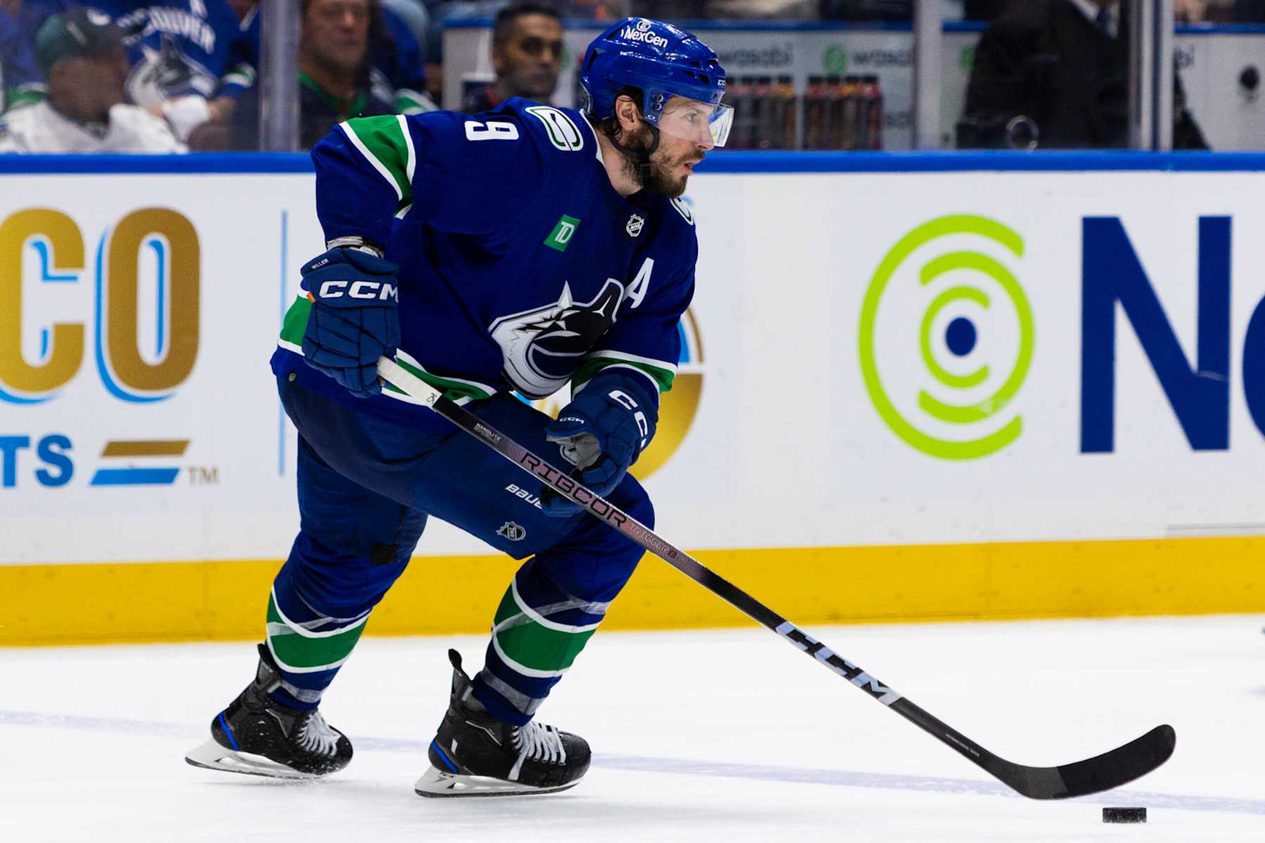 VANCOUVER, BC - MAY 20: Vancouver Canucks center J.T. Miller (9) with the puck during Game Seven of the Second Round of the 2024 Stanley Cup playoffs between the Edmonton Oilers and the Vancouver Canucks on May 20, 2024, at Rogers Arena in Vancouver, B.C. (Photo by Jamie Douglas/Icon Sportswire via Getty Images) VANCOUVER, BC - MAY 20: Vancouver Canucks center J.T. Miller (9) with the puck during Game Seven of the Second Round of the 2024 Stanley Cup playoffs between the Edmonton Oilers and the Vancouver Canucks on May 20, 2024, at Rogers Arena in Vancouver, B.C. (Photo by Jamie Douglas/Icon Sportswire via Getty Images)