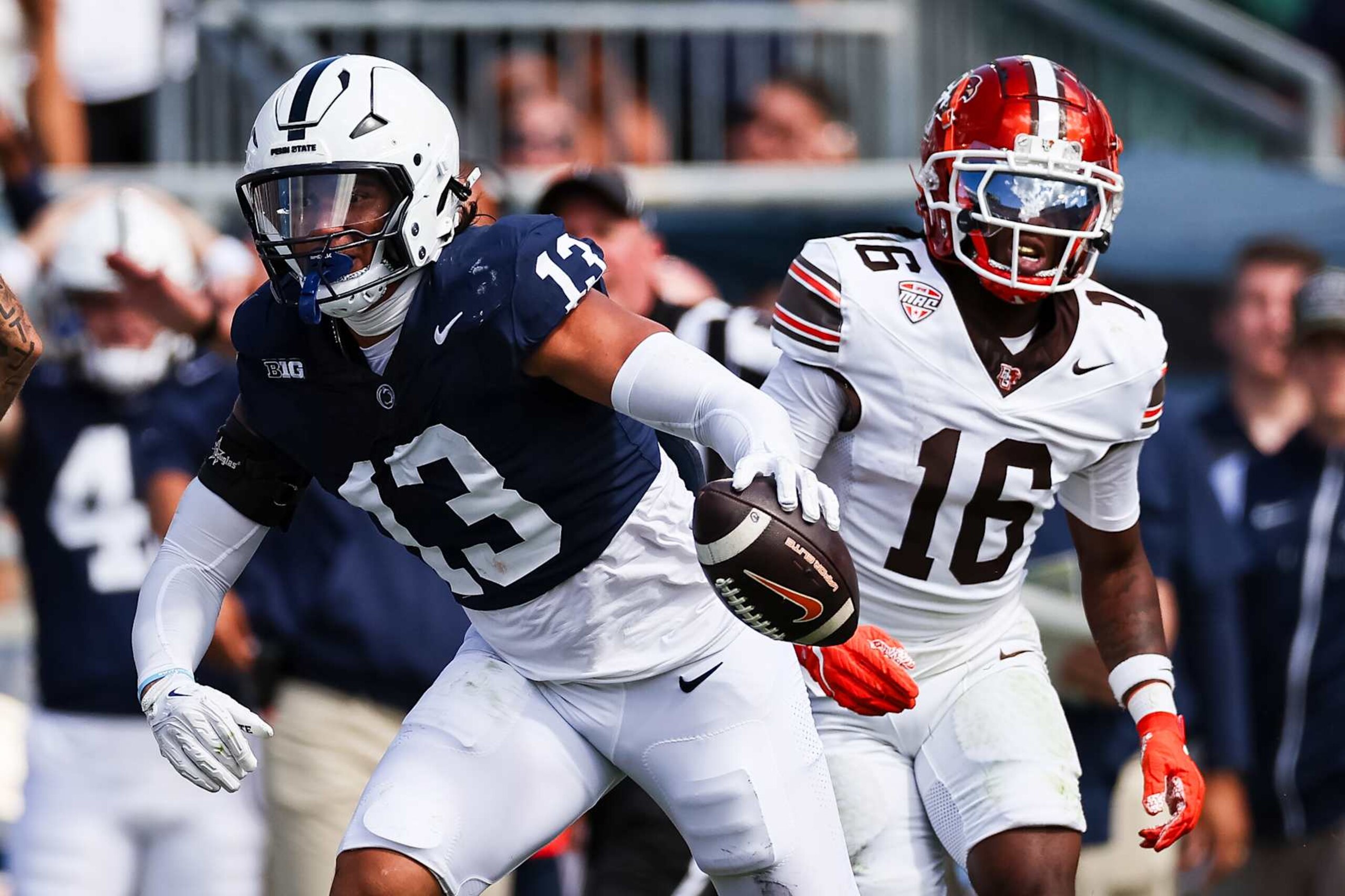 STATE COLLEGE, PA - SEPTEMBER 07: Tony Rojas #13 of the Penn State Nittany Lions intercepts a pass in front of Rahkeem Smith #16 of the Bowling Green Falcons during the second half at Beaver Stadium on September 7, 2024 in State College, Pennsylvania. (Photo by Scott Taetsch/Getty Images)
