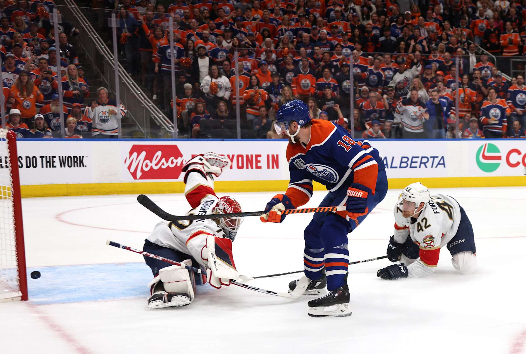 EDMONTON, ALBERTA - JUNE 21: Zach Hyman #18 of the Edmonton Oilers backhands the puck past goaltender Sergei Bobrovsky #72 of the Florida Panthers and into the net for a goal on a breakaway during the second period of Game Six of the 2024 Stanley Cup Final between Florida Panthers and the Edmonton Oilers at Rogers Place on June 21, 2024 in Edmonton, Alberta. Hyman scored on the play. (Photo by Dave Sandford/NHLI via Getty Images)