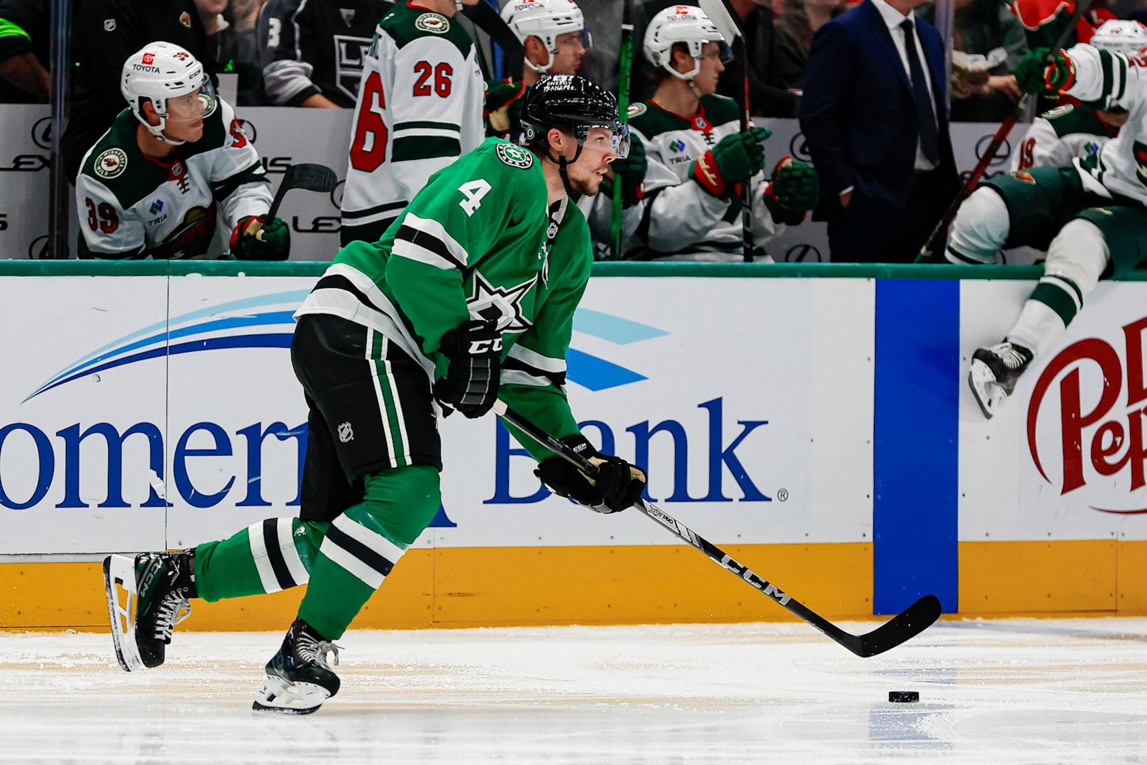 DALLAS, TX - SEPTEMBER 27: Dallas Stars defenseman Miro Heiskanen (4) skates with the puck during the game between the Dallas Stars and the Minnesota Wild on September 25, 2024 at American Airlines Center in Dallas, Texas. (Photo by Matthew Pearce/Icon Sportswire via Getty Images) DALLAS, TX - SEPTEMBER 27: Dallas Stars defenseman Miro Heiskanen (4) skates with the puck during the game between the Dallas Stars and the Minnesota Wild on September 25, 2024 at American Airlines Center in Dallas, Texas. (Photo by Matthew Pearce/Icon Sportswire via Getty Images)