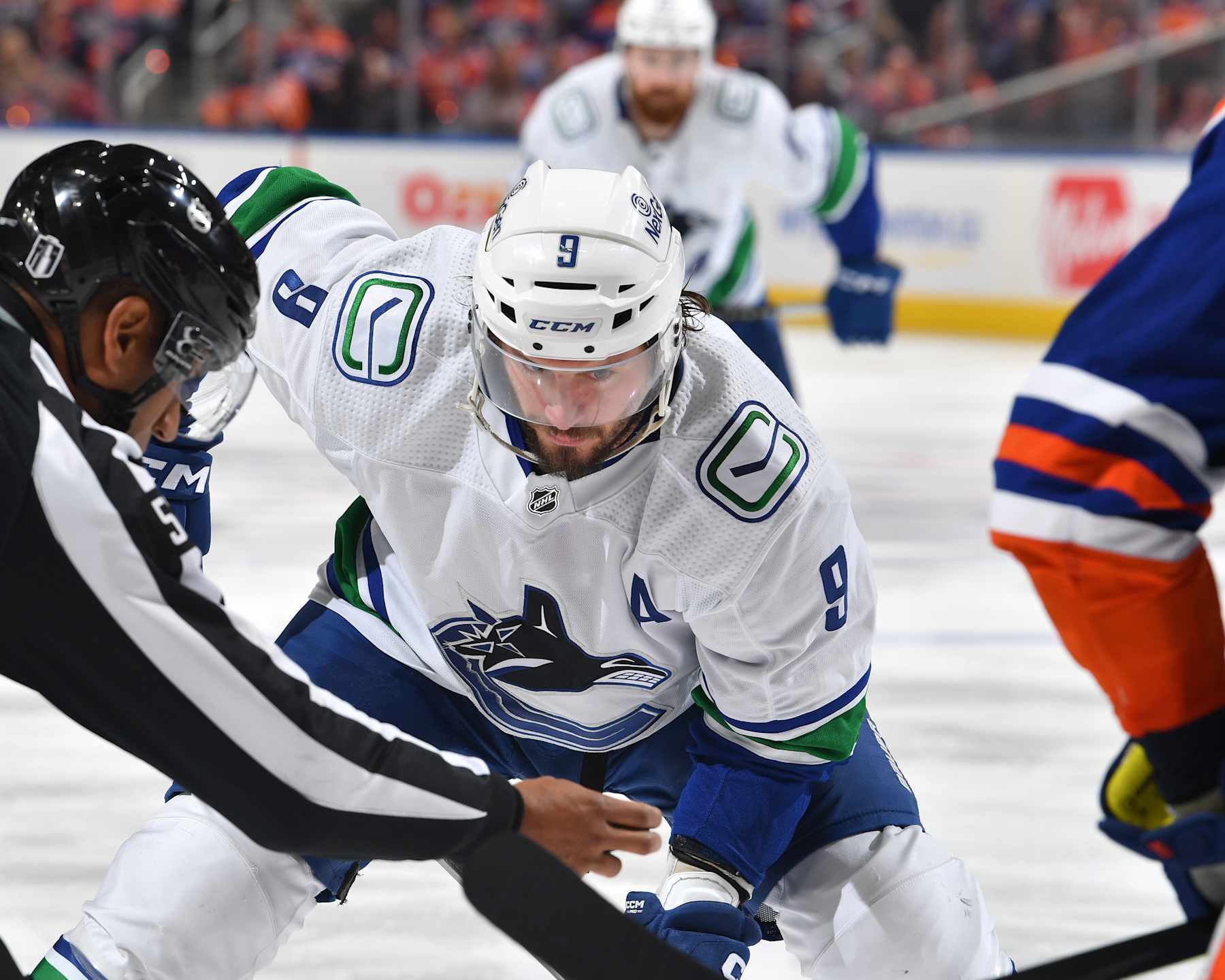 EDMONTON, CANADA - MAY 18: J.T. Miller #9 of the Vancouver Canucks prepares to take a face-off against Leon Draisaitl #29 of the Edmonton Oilers during Game Six of the Second Round of the 2024 Stanley Cup Playoffs at Rogers Place on May 18, 2024, in Edmonton, Alberta, Canada. (Photo by Andy Devlin/NHLI via Getty Images)
