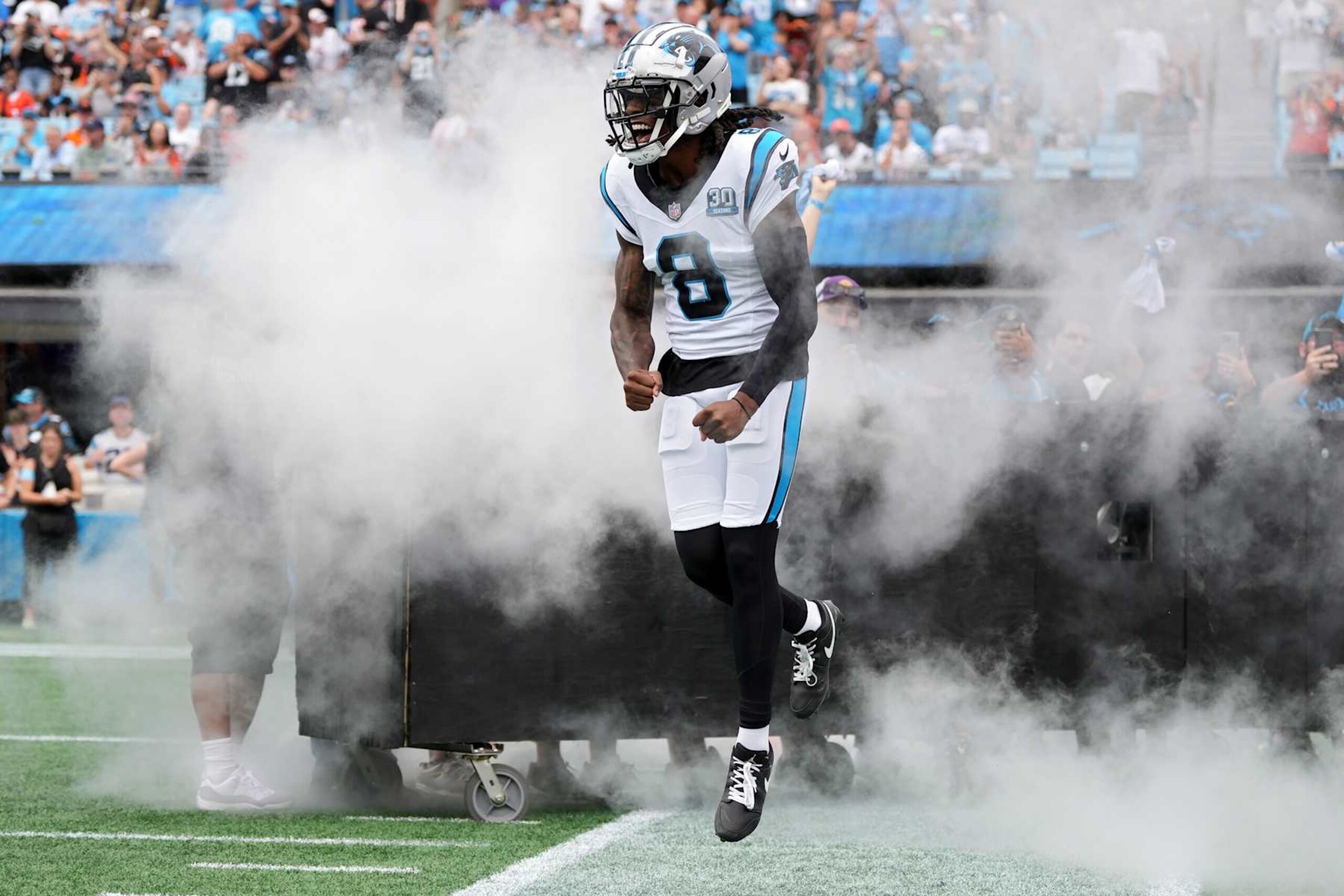 CHARLOTTE, NORTH CAROLINA - SEPTEMBER 29: Jaycee Horn #8 of the Carolina Panthers runs onto the field before the game against the Cincinnati Bengals at Bank of America Stadium on September 29, 2024 in Charlotte, North Carolina. (Photo by Grant Halverson/Getty Images)
