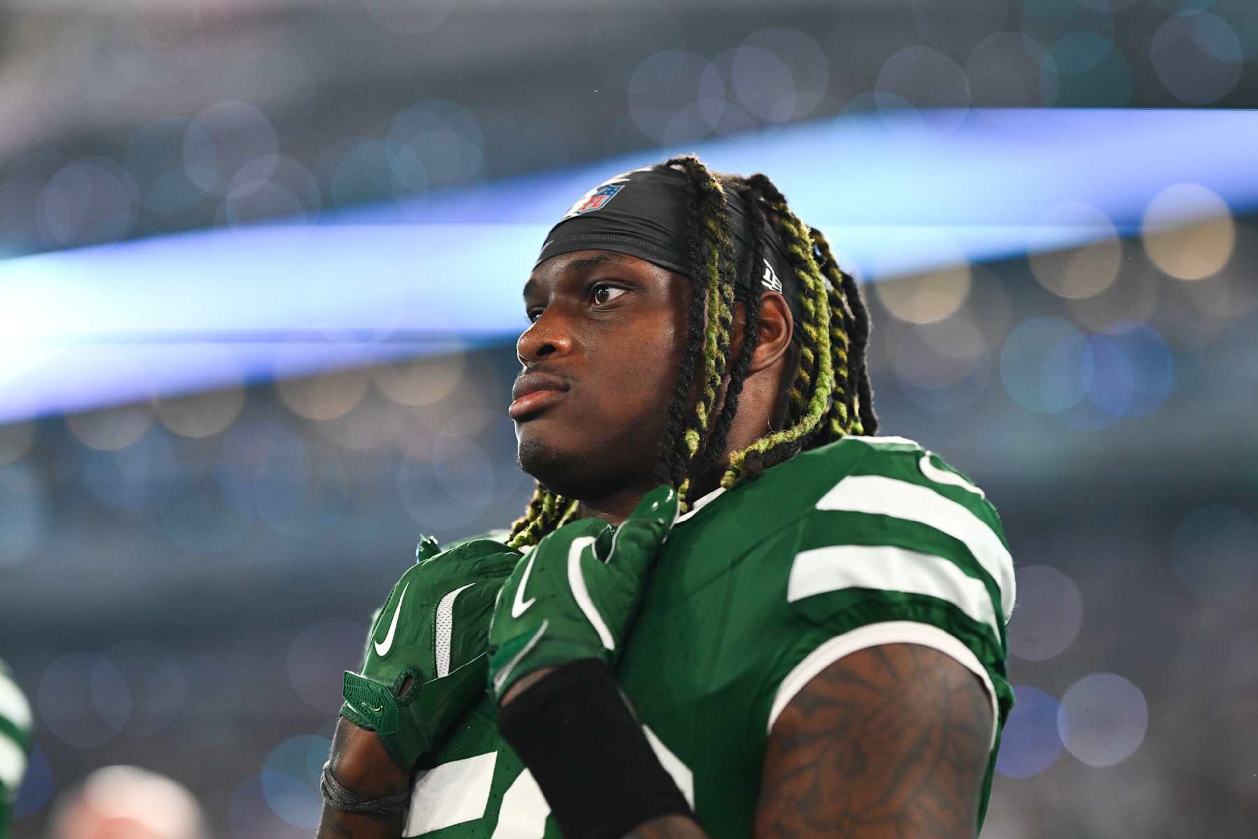 EAST RUTHERFORD, NEW JERSEY - SEPTEMBER 19:	 Quincy Williams #56 of the New York Jets stands on the field prior to the start of the game against the New England Patriots at MetLife Stadium on September 19, 2024 in East Rutherford, New Jersey. (Photo by Kathryn Riley/Getty Images)