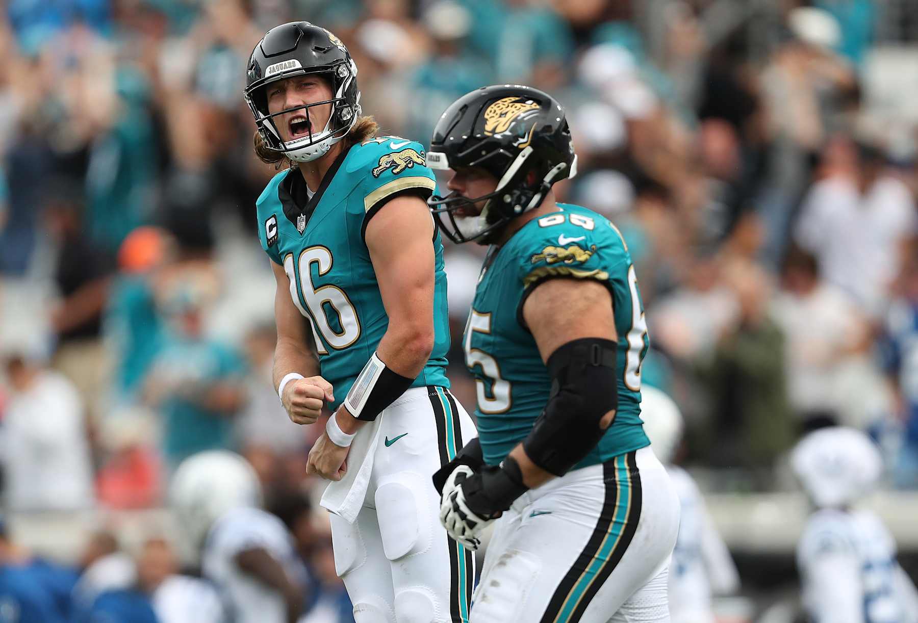 JACKSONVILLE, FLORIDA - OCTOBER 06: Quarterback Trevor Lawrence #16 of the Jacksonville Jaguars reacts during the first half of a game against the Indianapolis Colts at EverBank Stadium on October 06, 2024 in Jacksonville, Florida. (Photo by Courtney Culbreath/Getty Images)