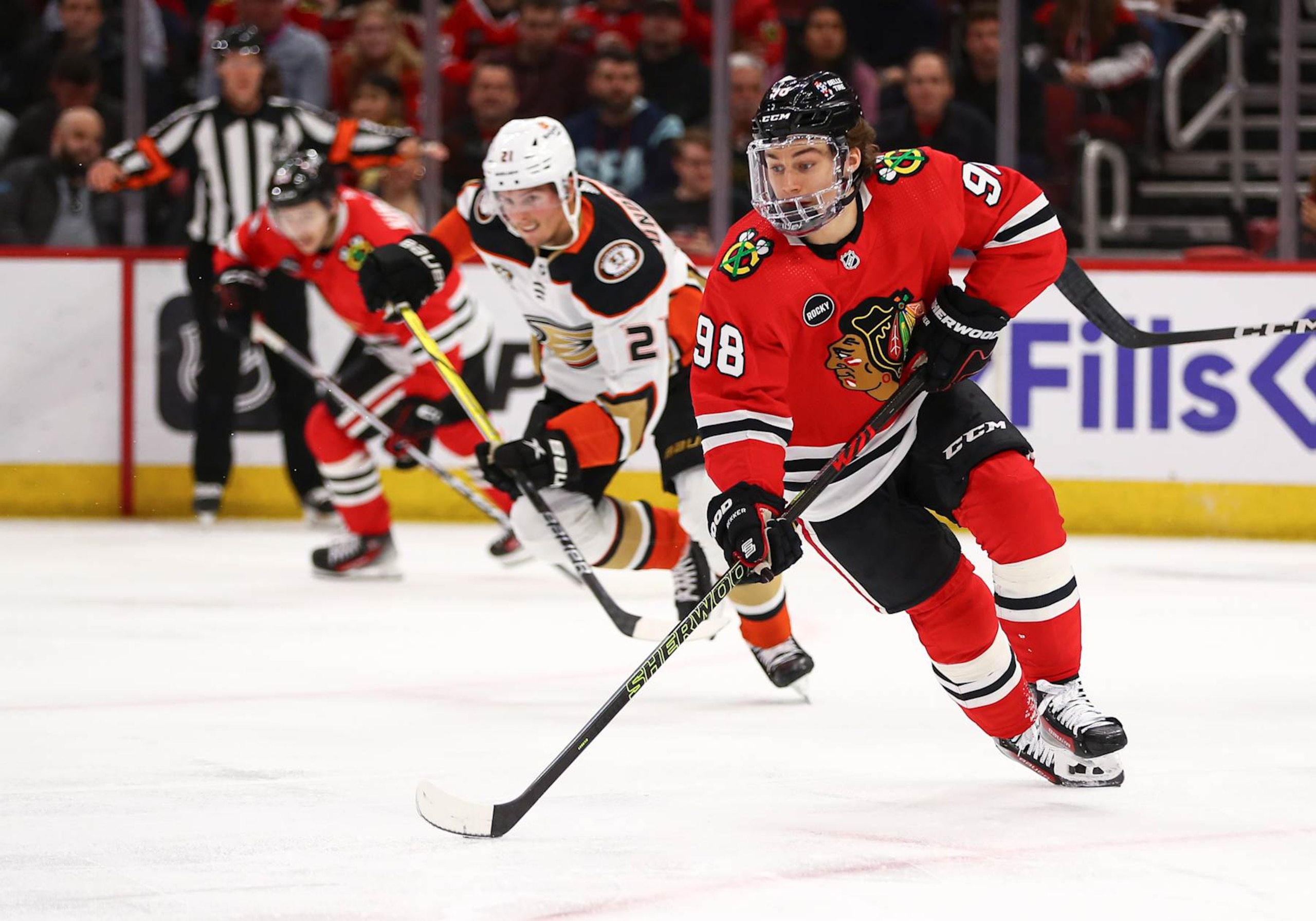 CHICAGO, IL - MARCH 12: Connor Bedard #98 of the Chicago Blackhawks controls the puck during the second period against the Anaheim Ducks at the United Center on March 12, 2024 in Chicago, Illinois. (Photo by Melissa Tamez/Icon Sportswire via Getty Images)