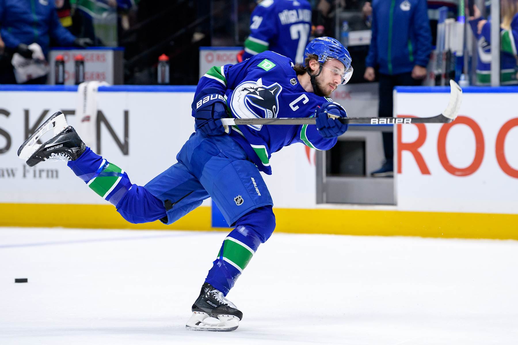VANCOUVER, CANADA - MAY 20: Quinn Hughes #43 of the Vancouver Canucks takes a shot during warm-up prior to Game Seven of the Second Round of the 2024 Stanley Cup Playoffs against the Edmonton Oilers at Rogers Arena on May 20, 2024 in Vancouver, British Columbia, Canada. (Photo by Derek Cain/Getty Images)