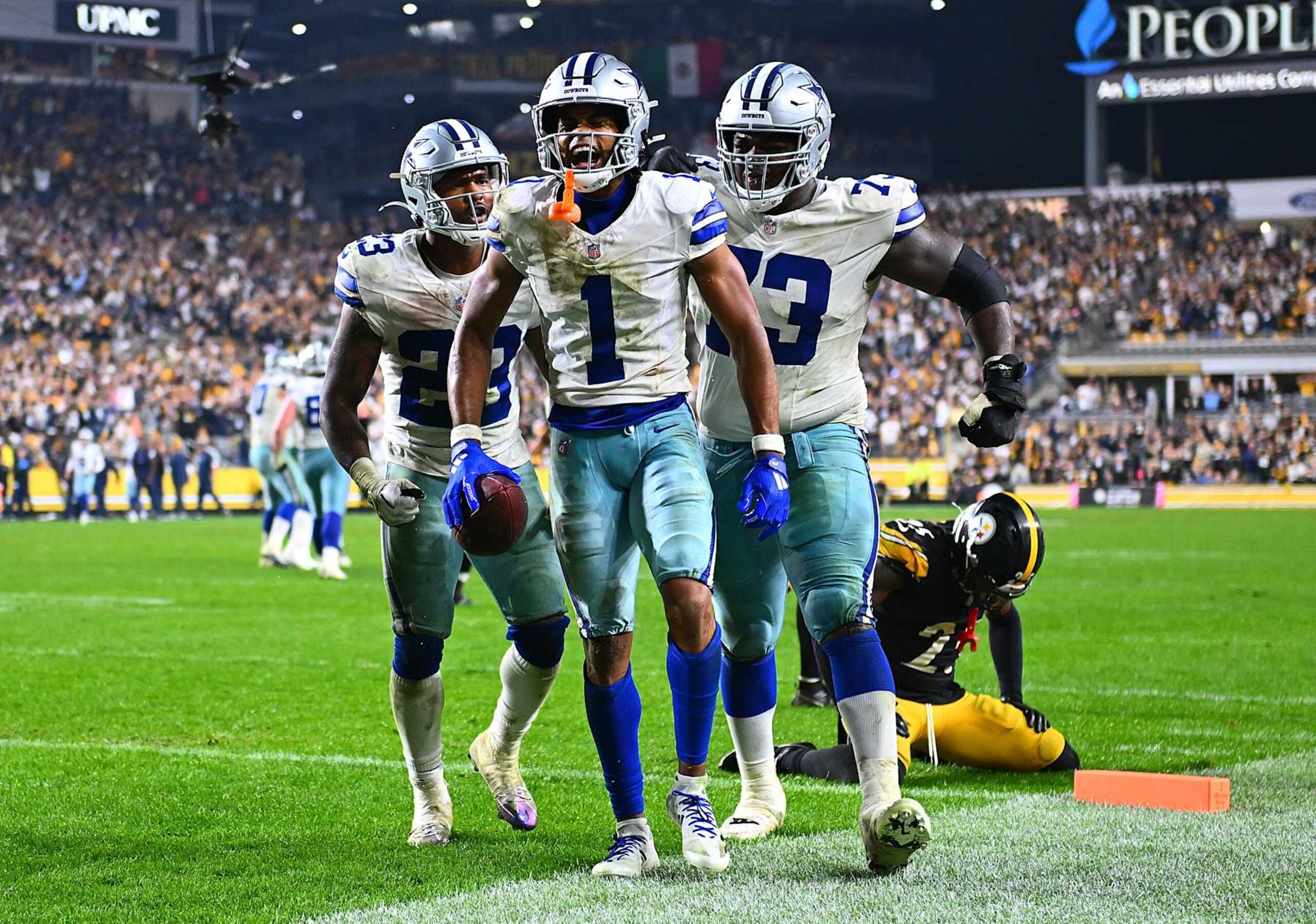 PITTSBURGH, PENNSYLVANIA - OCTOBER 7:  Jalen Tolbert #1 of the Dallas Cowboys celebrates his touchdown with teammates during the fourth quarter against the Pittsburgh Steelers at Acrisure Stadium on October 7, 2024 in Pittsburgh, Pennsylvania. Dallas won the game 20-17. (Photo by Joe Sargent/Getty Images)