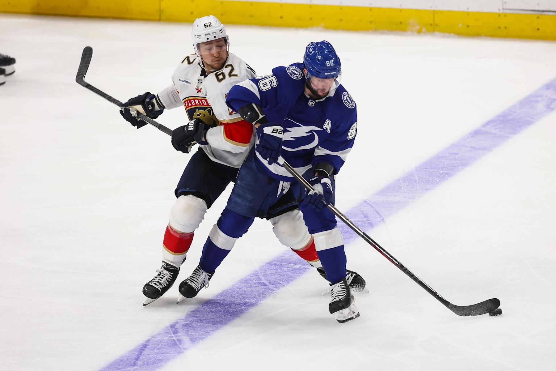 TAMPA, FL - APRIL 25: Nikita Kucherov #86 of the Tampa Bay Lightning skates against Brandon Montour #62 of the Florida Panthers in Game Three of the First Round of the 2024 Stanley Cup Playoffs at Amalie Arena on April 25, 2024 in Tampa, Florida. (Photo by Mike Carlson/NHLI via Getty Images)