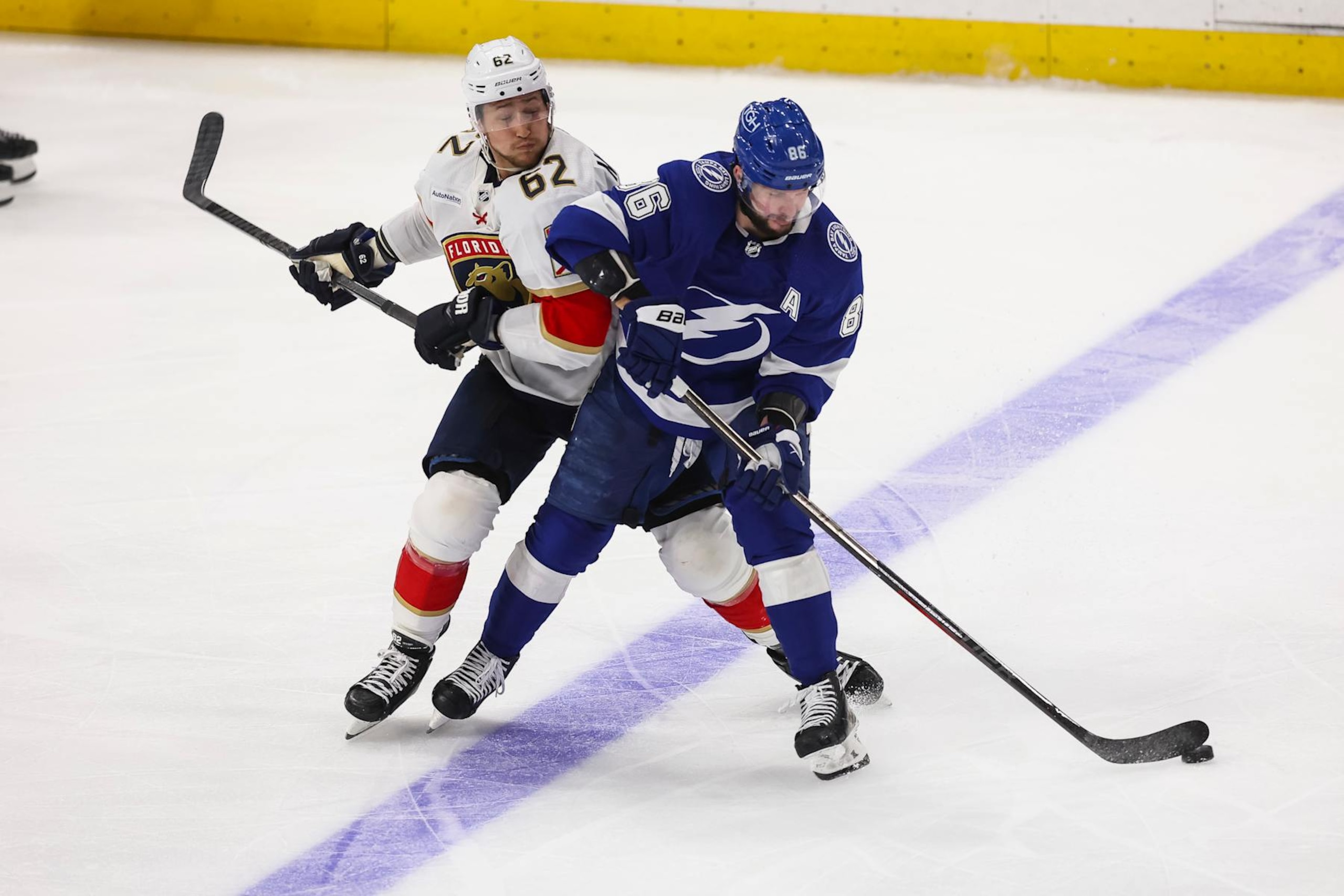 TAMPA, FL - APRIL 25: Nikita Kucherov #86 of the Tampa Bay Lightning skates against Brandon Montour #62 of the Florida Panthers in Game Three of the First Round of the 2024 Stanley Cup Playoffs at Amalie Arena on April 25, 2024 in Tampa, Florida. (Photo by Mike Carlson/NHLI via Getty Images) TAMPA, FL - APRIL 25: Nikita Kucherov #86 of the Tampa Bay Lightning skates against Brandon Montour #62 of the Florida Panthers in Game Three of the First Round of the 2024 Stanley Cup Playoffs at Amalie Arena on April 25, 2024 in Tampa, Florida. (Photo by Mike Carlson/NHLI via Getty Images)