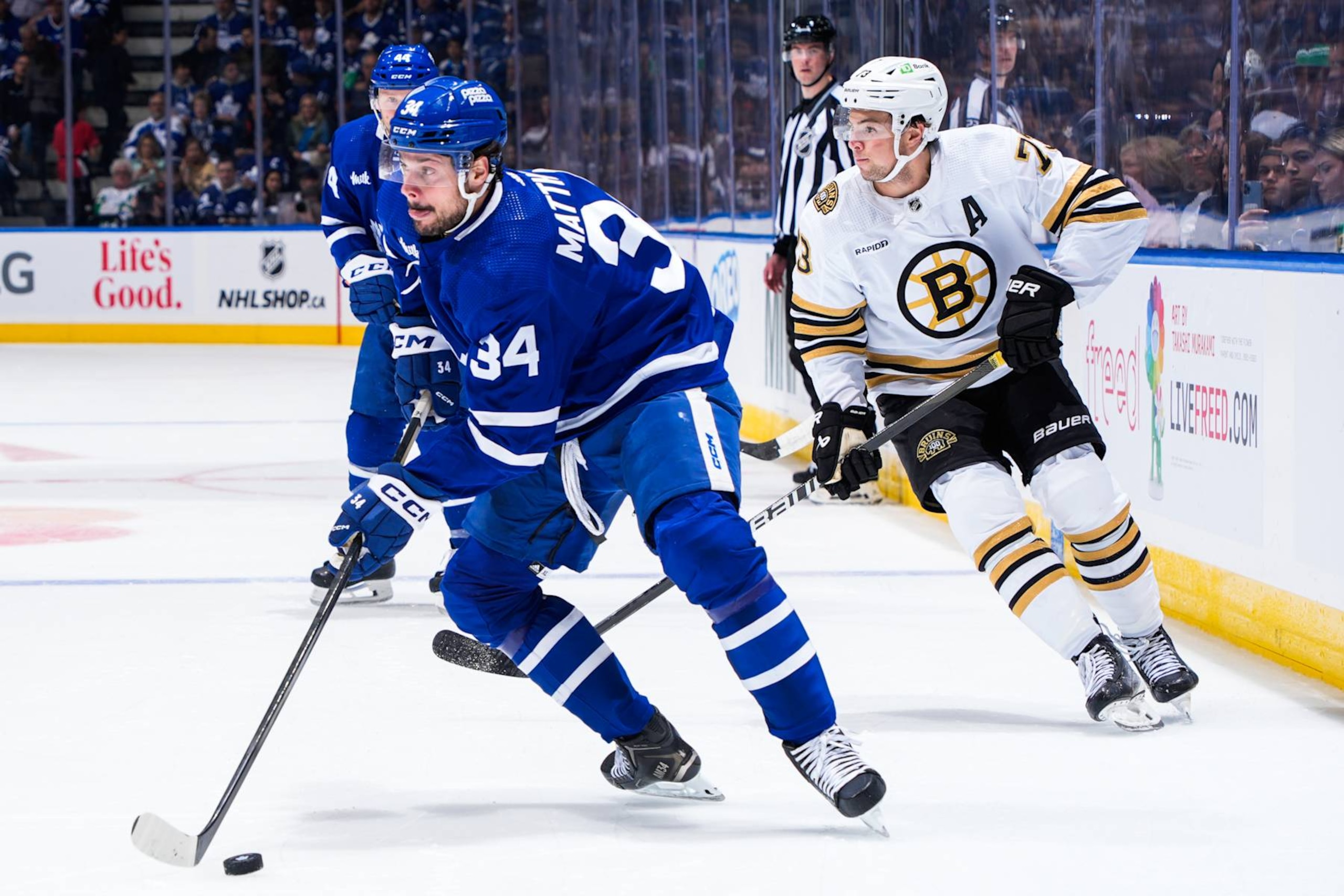 TORONTO, ON - APRIL 27: Auston Matthews #34 of the Toronto Maple Leafs plays the puck against the Boston Bruins during the first period in Game Four of the First Round of the 2024 Stanley Cup Playoffs at Scotiabank Arena on April 27, 2024 in Toronto, Ontario, Canada. (Photo by Mark Blinch/NHLI via Getty Images) TORONTO, ON - APRIL 27: Auston Matthews #34 of the Toronto Maple Leafs plays the puck against the Boston Bruins during the first period in Game Four of the First Round of the 2024 Stanley Cup Playoffs at Scotiabank Arena on April 27, 2024 in Toronto, Ontario, Canada. (Photo by Mark Blinch/NHLI via Getty Images)