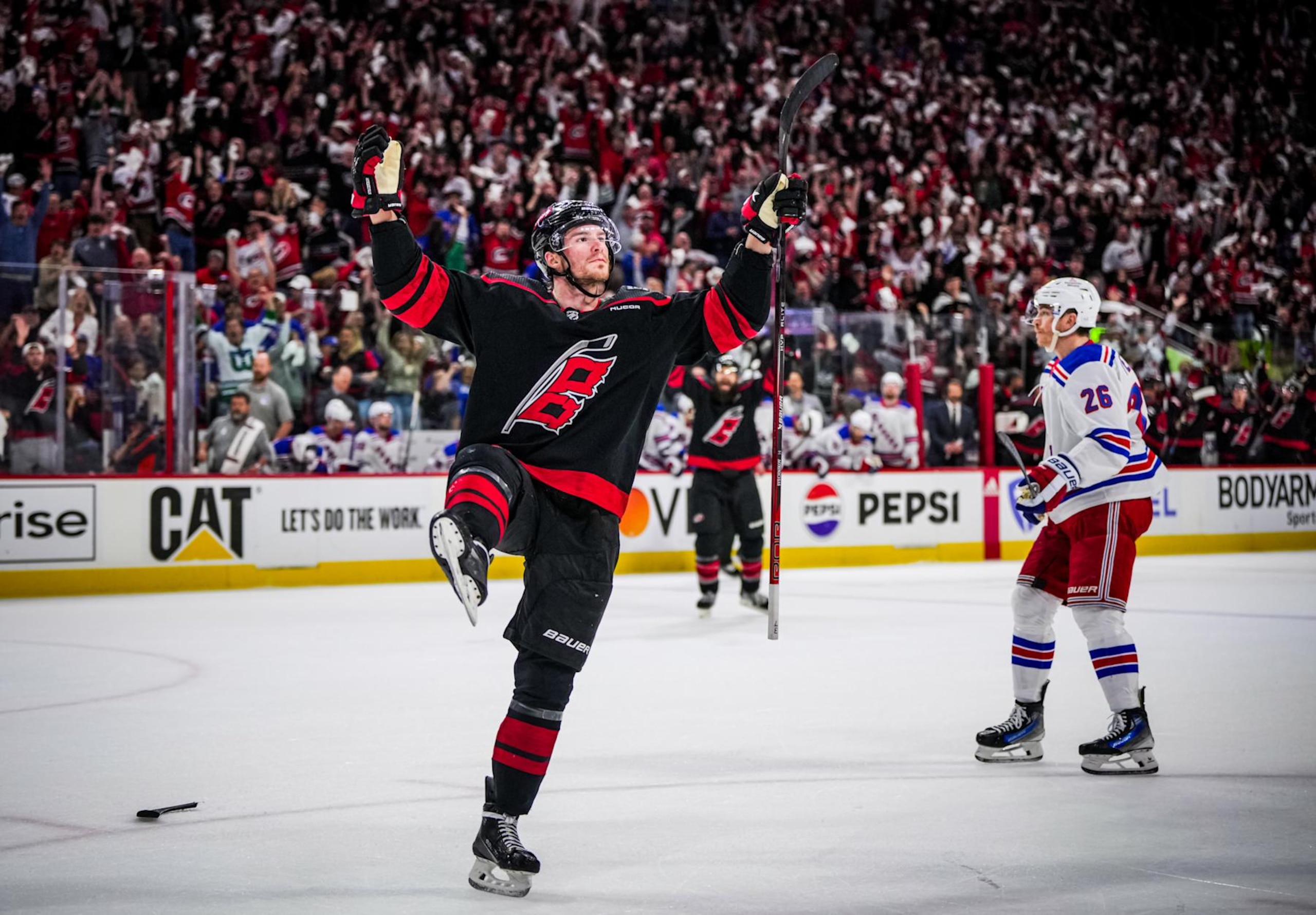RALEIGH, NORTH CAROLINA - MAY 09: Andrei Svechnikov #37 of the Carolina Hurricanes celebrates his goal against the New York Rangers during the third period in Game Three of the Second Round of the 2024 Stanley Cup Playoffs at PNC Arena on May 09, 2024 in Raleigh, North Carolina. (Photo by Josh Lavallee/NHLI via Getty Images) RALEIGH, NORTH CAROLINA - MAY 09: Andrei Svechnikov #37 of the Carolina Hurricanes celebrates his goal against the New York Rangers during the third period in Game Three of the Second Round of the 2024 Stanley Cup Playoffs at PNC Arena on May 09, 2024 in Raleigh, North Carolina. (Photo by Josh Lavallee/NHLI via Getty Images)