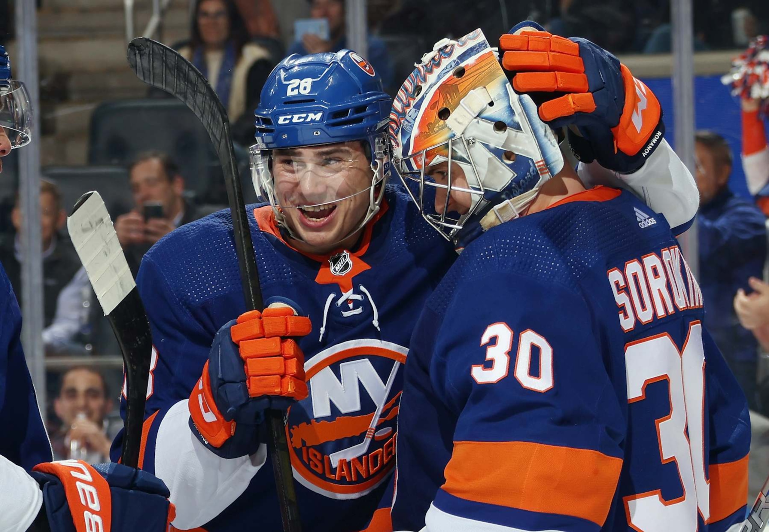 ELMONT, NEW YORK - APRIL 02: Alexander Romanov #28 and Ilya Sorokin #30 of the New York Islanders celebrate their 2-1 victory over the Chicago Blackhawks at UBS Arena on April 02, 2024 in Elmont, New York. (Photo by Bruce Bennett/Getty Images) ELMONT, NEW YORK - APRIL 02: Alexander Romanov #28 and Ilya Sorokin #30 of the New York Islanders celebrate their 2-1 victory over the Chicago Blackhawks at UBS Arena on April 02, 2024 in Elmont, New York. (Photo by Bruce Bennett/Getty Images)
