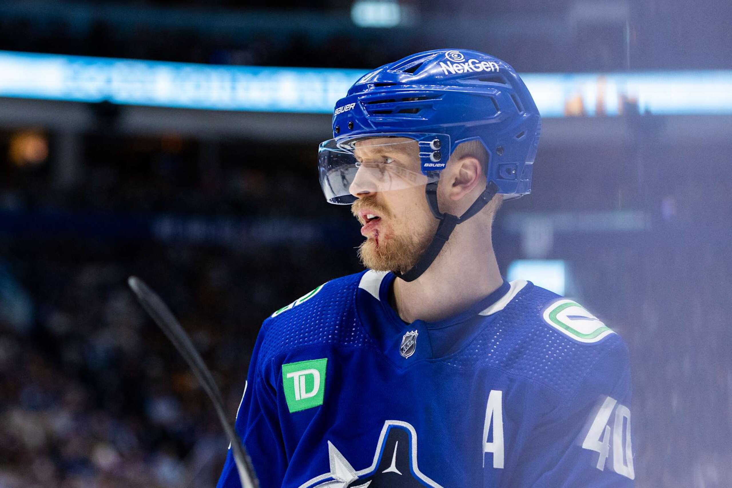 VANCOUVER, BC - MAY 20: Vancouver Canucks center Elias Pettersson (40) shown with a cut to his chin during Game Seven of the Second Round of the 2024 Stanley Cup playoffs between the Edmonton Oilers and the Vancouver Canucks on May 20, 2024, at Rogers Arena in Vancouver, B.C. (Photo by Jamie Douglas/Icon Sportswire via Getty Images) VANCOUVER, BC - MAY 20: Vancouver Canucks center Elias Pettersson (40) shown with a cut to his chin during Game Seven of the Second Round of the 2024 Stanley Cup playoffs between the Edmonton Oilers and the Vancouver Canucks on May 20, 2024, at Rogers Arena in Vancouver, B.C. (Photo by Jamie Douglas/Icon Sportswire via Getty Images)