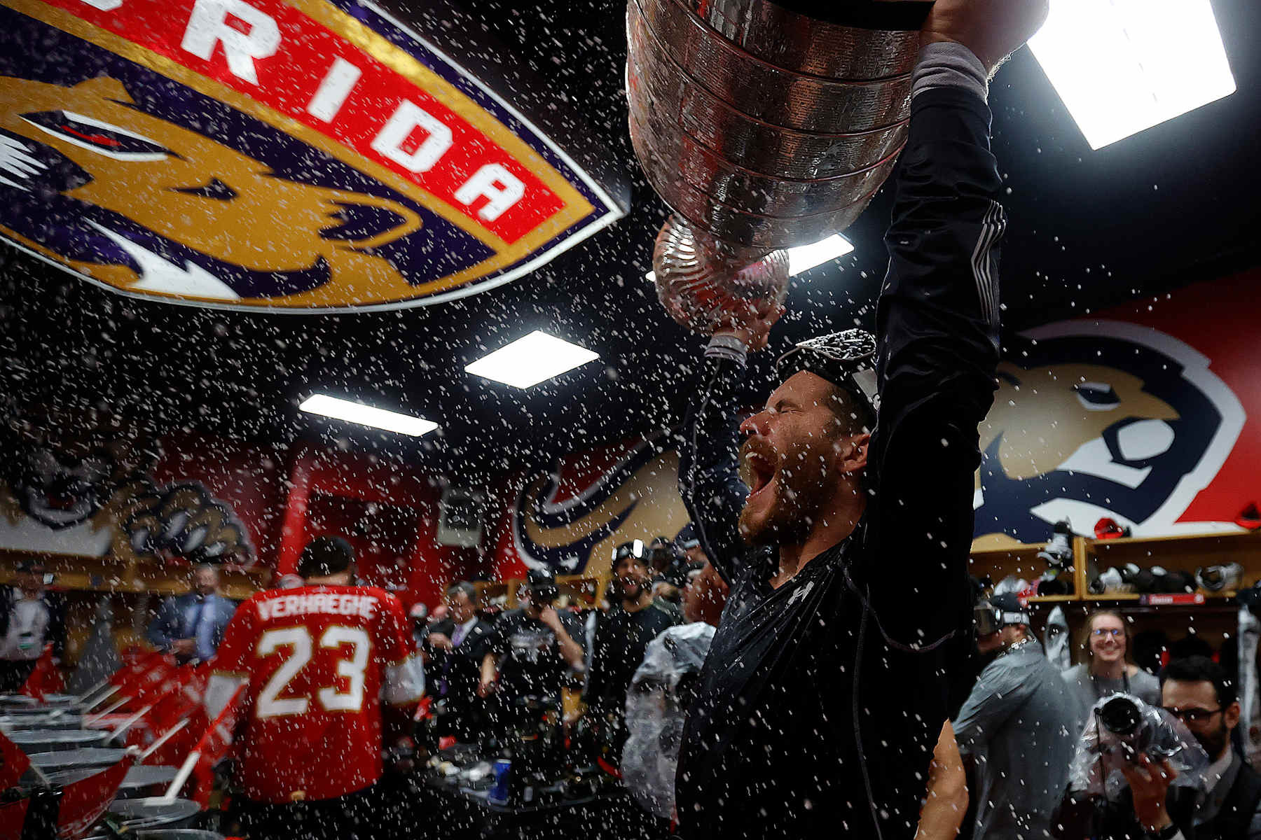 SUNRISE, FLORIDA - JUNE 24: Matthew Tkachuk #19 of the Florida Panthers enjoys locker room festivities after defeating the Edmonton Oilers in Game Seven of the Stanley Cup Final at the Amerant Bank Arena on June 24, 2024 in Sunrise, Florida. (Photo by Eliot J. Schechter/NHLI via Getty Images)