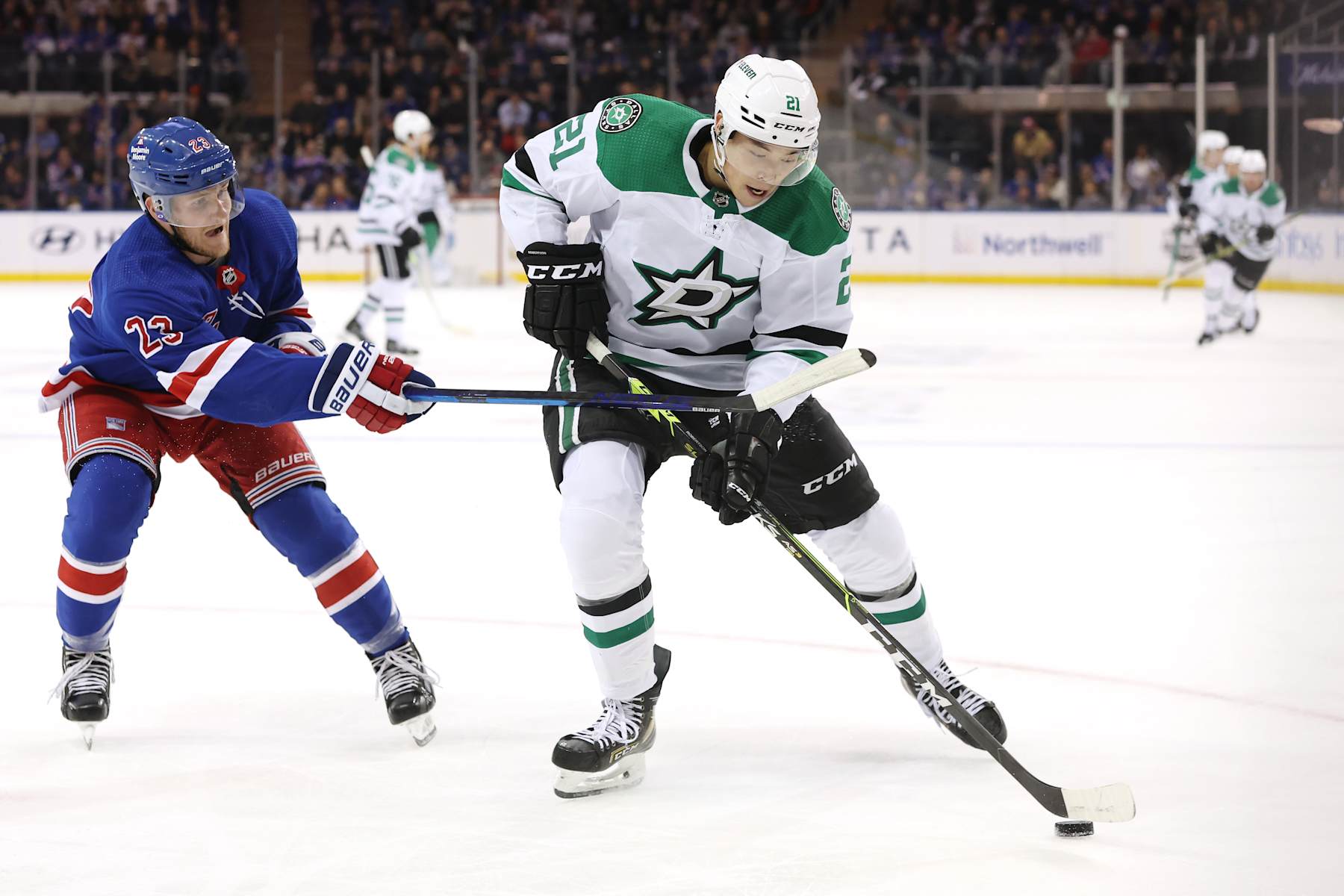 Adam Fox and Jason Robertson