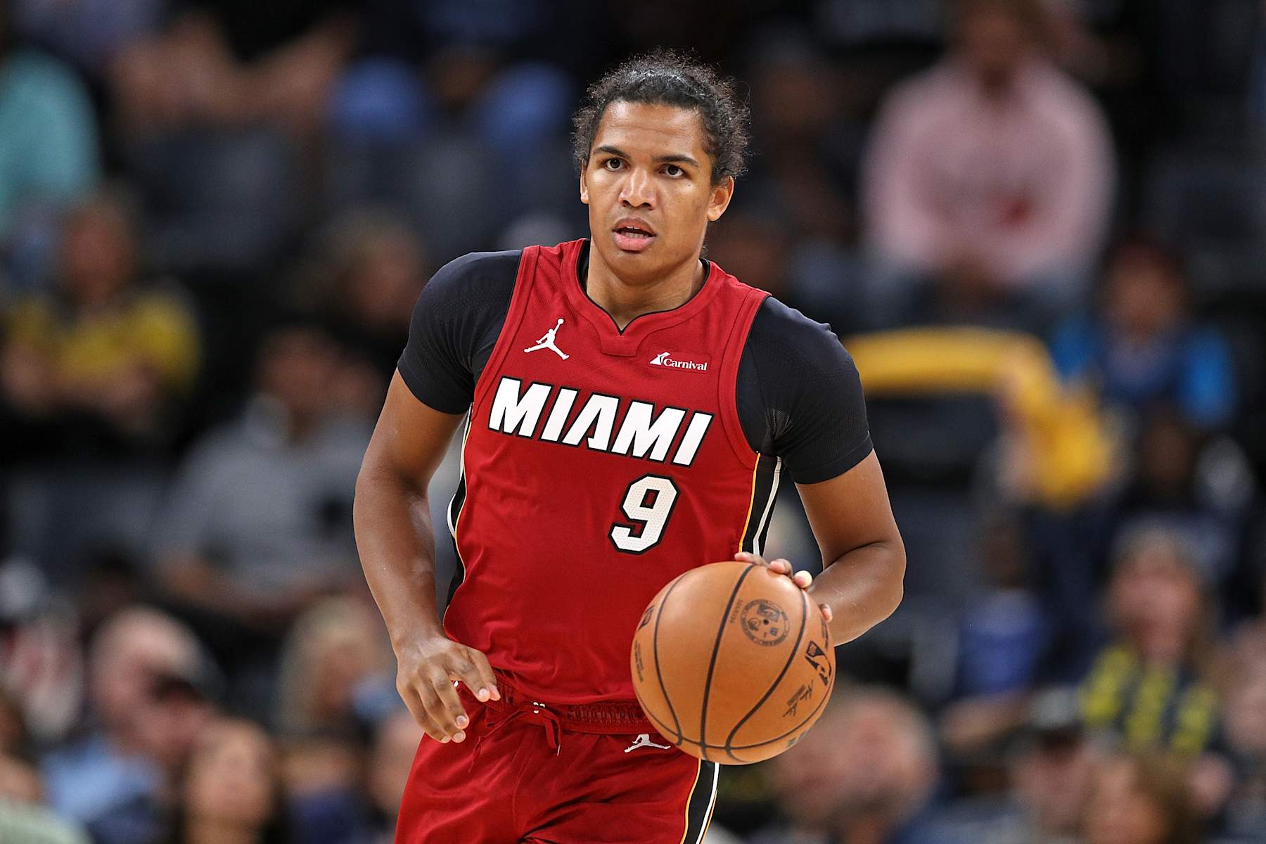 MEMPHIS, TENNESSEE - NOVEMBER 08: Dru Smith #9 of the Miami Heat brings the ball up court during the game against the Memphis Grizzlies at FedExForum on November 08, 2023 in Memphis, Tennessee. NOTE TO USER: User expressly acknowledges and agrees that, by downloading and or using this photograph, User is consenting to the terms and conditions of the Getty Images License Agreement. (Photo by Justin Ford/Getty Images)