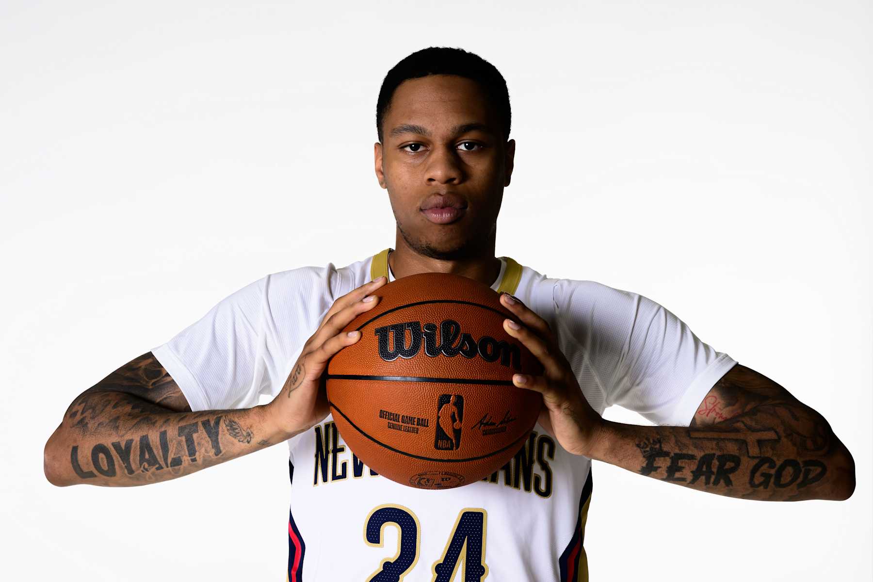NEW ORLEANS, LOUISIANA - SEPTEMBER 30: Jordan Hawkins #24 of the New Orleans Pelicans poses for a photo during media day at Smoothie King Center on September 30, 2024 in New Orleans, Louisiana. NOTE TO USER: User expressly acknowledges and agrees that, by downloading and or using this photograph, User is consenting to the terms and conditions of the Getty Images License Agreement. (Photo by Gus Stark/Getty Images)