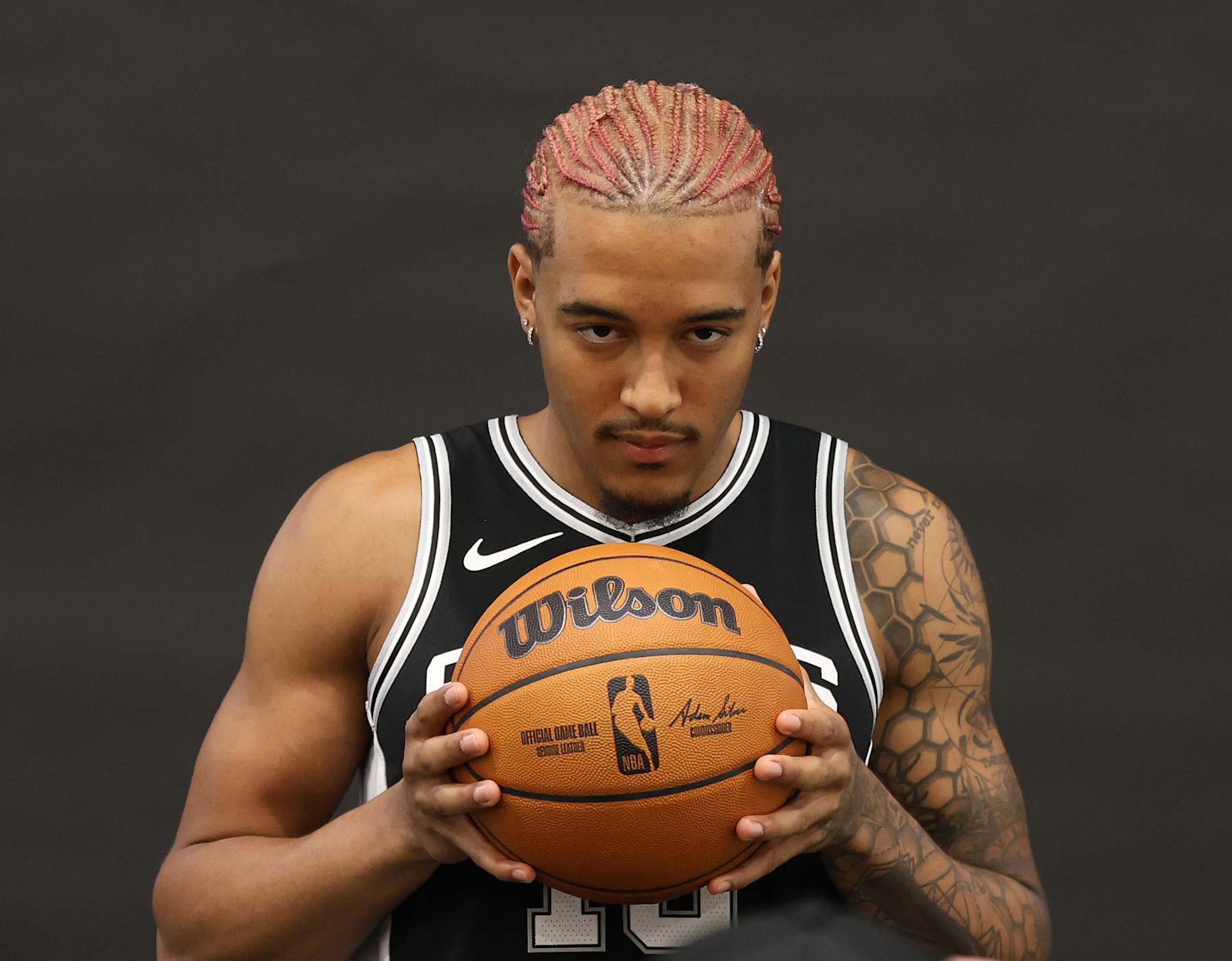 SAN ANTONIO, TX - SEPTEMBER 30: Jeremy Sochan #10 of the San Antonio Spurs poses for photographs at the San Antonio Spurs Media Day at the Victory Capital Performance Center on September 30, 2024 in San Antonio, Texas. NOTE TO USER: User expressly acknowledges and agrees that, by downloading and or using this photograph, User is consenting to terms and conditions of the Getty Images License Agreement. (Photo by Ronald Cortes/Getty Images)