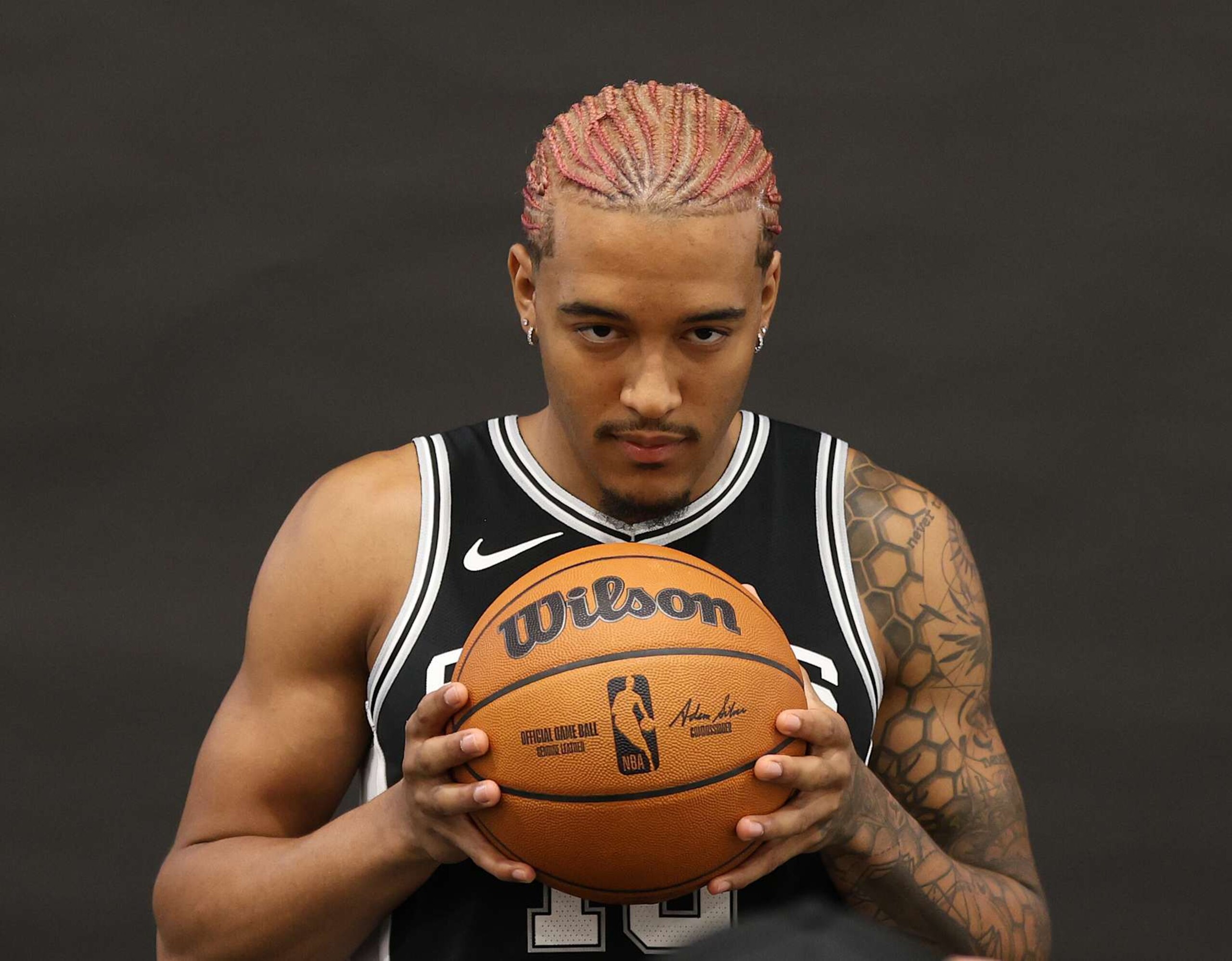 SAN ANTONIO, TX - SEPTEMBER 30: Jeremy Sochan #10 of the San Antonio Spurs poses for photographs at the San Antonio Spurs Media Day at the Victory Capital Performance Center on September 30, 2024 in San Antonio, Texas. NOTE TO USER: User expressly acknowledges and agrees that, by downloading and or using this photograph, User is consenting to terms and conditions of the Getty Images License Agreement. (Photo by Ronald Cortes/Getty Images)