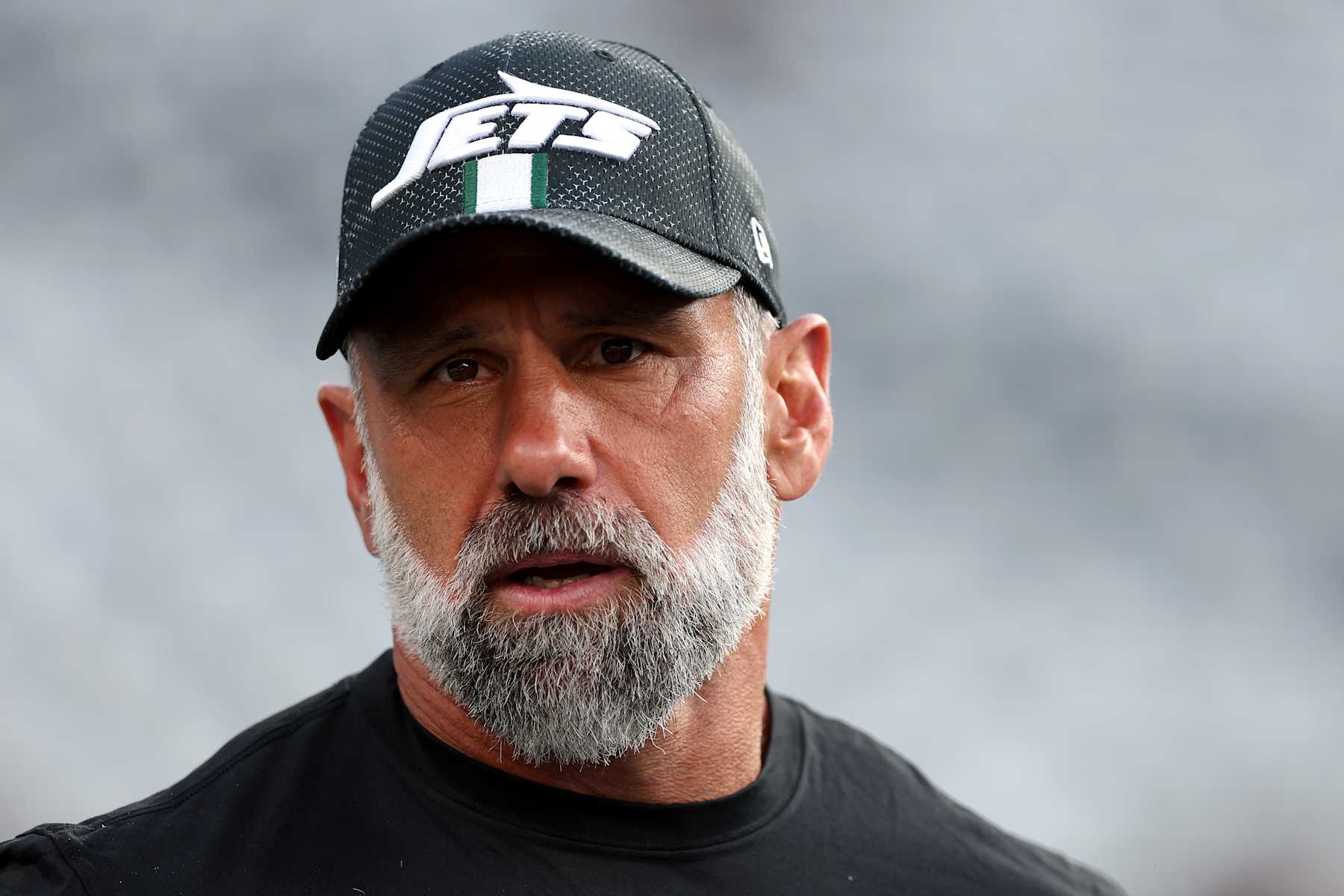EAST RUTHERFORD, NEW JERSEY - AUGUST 24: Jeff Ulbrich of the New York Jets looks on against the New York Giants before a preseason game at MetLife Stadium on August 24, 2024 in East Rutherford, New Jersey.  (Photo by Luke Hales/Getty Images)