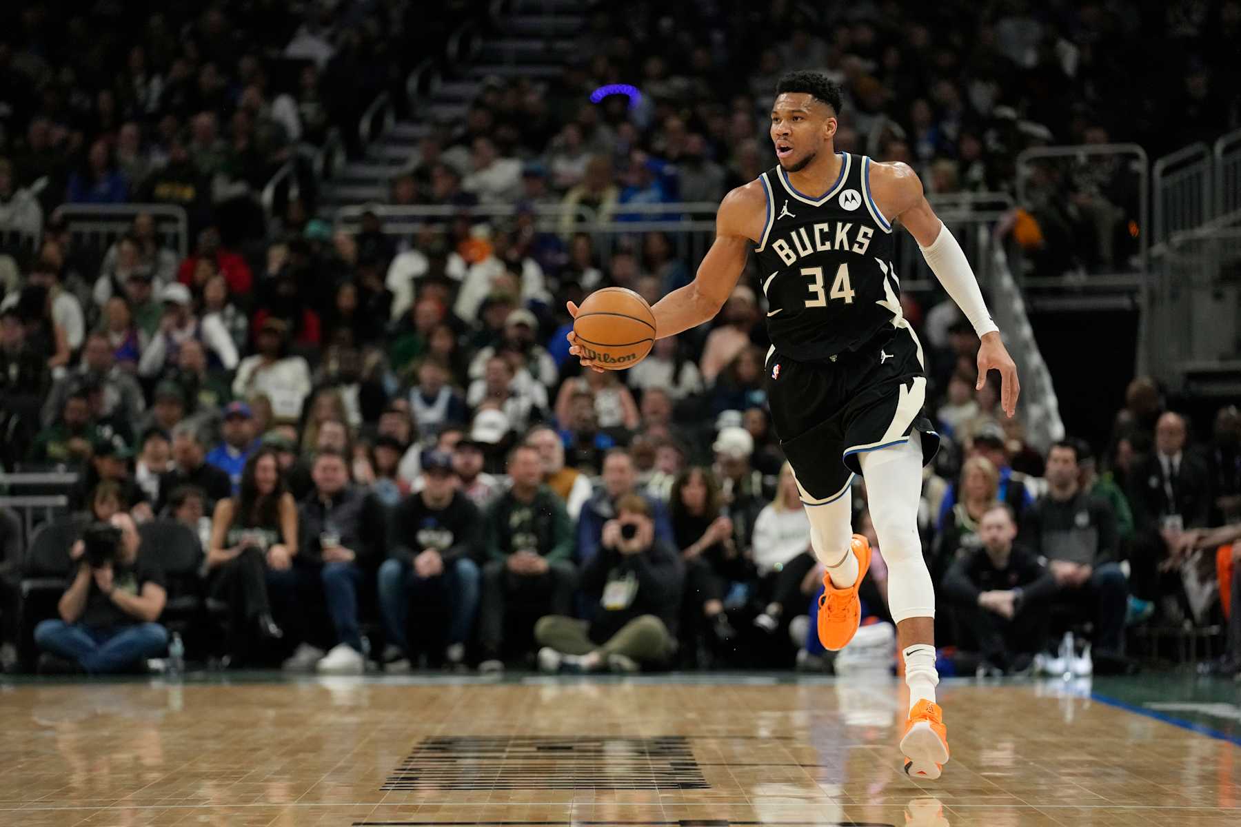 MILWAUKEE, WISCONSIN - APRIL 07: Giannis Antetokounmpo #34 of the Milwaukee Bucks dribbles the ball during the first half against the New York Knicks at Fiserv Forum on April 07, 2024 in Milwaukee, Wisconsin. NOTE TO USER: User expressly acknowledges and agrees that, by downloading and or using this photograph, User is consenting to the terms and conditions of the Getty Images License Agreement. (Photo by Patrick McDermott/Getty Images)
