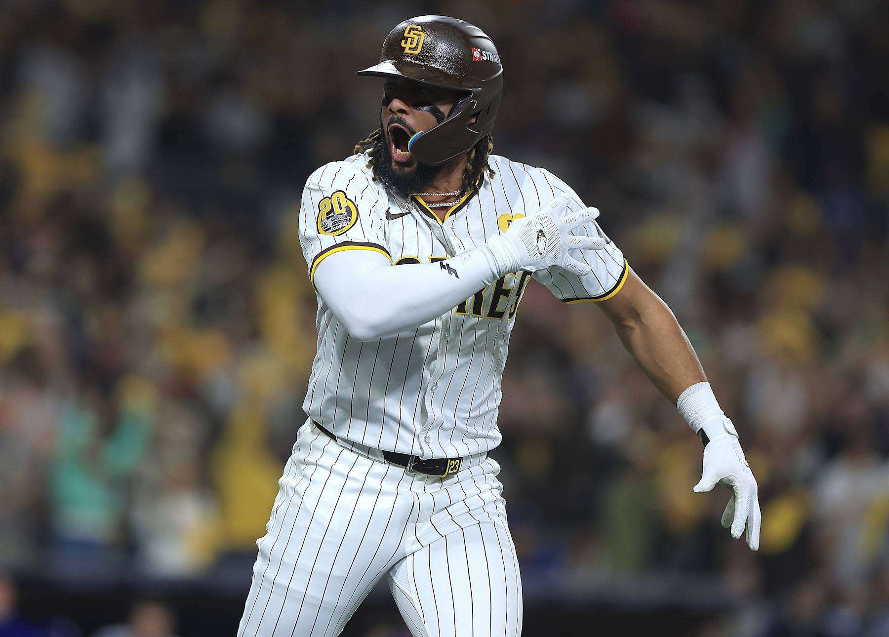 SAN DIEGO, CALIFORNIA - OCTOBER 08: Fernando Tatis Jr. #23 of the San Diego Padres celebrates after hitting a home run in the second inning against the Los Angeles Dodgers during Game Three of the Division Series at Petco Park on October 08, 2024 in San Diego, California. (Photo by Sean M. Haffey/Getty Images)
