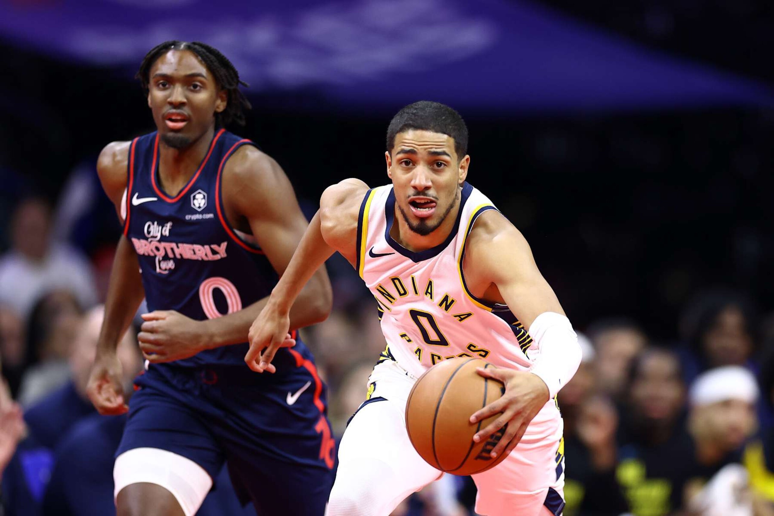 PHILADELPHIA, PENNSYLVANIA - NOVEMBER 14: Tyrese Haliburton #0 of the Indiana Pacers dribbles past Tyrese Maxey #0 of the Philadelphia 76ers at the Wells Fargo Center on November 14, 2023 in Philadelphia, Pennsylvania. NOTE TO USER: User expressly acknowledges and agrees that, by downloading and or using this photograph, User is consenting to the terms and conditions of the Getty Images License Agreement. (Photo by Tim Nwachukwu/Getty Images) PHILADELPHIA, PENNSYLVANIA - NOVEMBER 14: Tyrese Haliburton #0 of the Indiana Pacers dribbles past Tyrese Maxey #0 of the Philadelphia 76ers at the Wells Fargo Center on November 14, 2023 in Philadelphia, Pennsylvania. NOTE TO USER: User expressly acknowledges and agrees that, by downloading and or using this photograph, User is consenting to the terms and conditions of the Getty Images License Agreement. (Photo by Tim Nwachukwu/Getty Images)