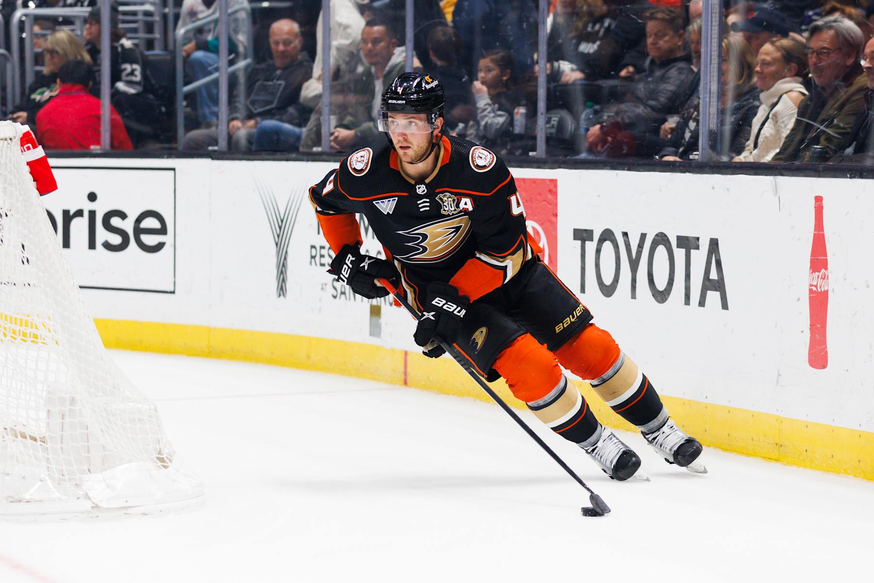 LOS ANGELES, CA - APRIL 13: Anaheim Ducks defenseman Cam Fowler (4) skates with the puck during an NHL game against the Los Angeles Kings on April 13, 2024 at Crypto.com Arena in Los Angeles, CA. (Photo by Ric Tapia/Icon Sportswire via Getty Images)