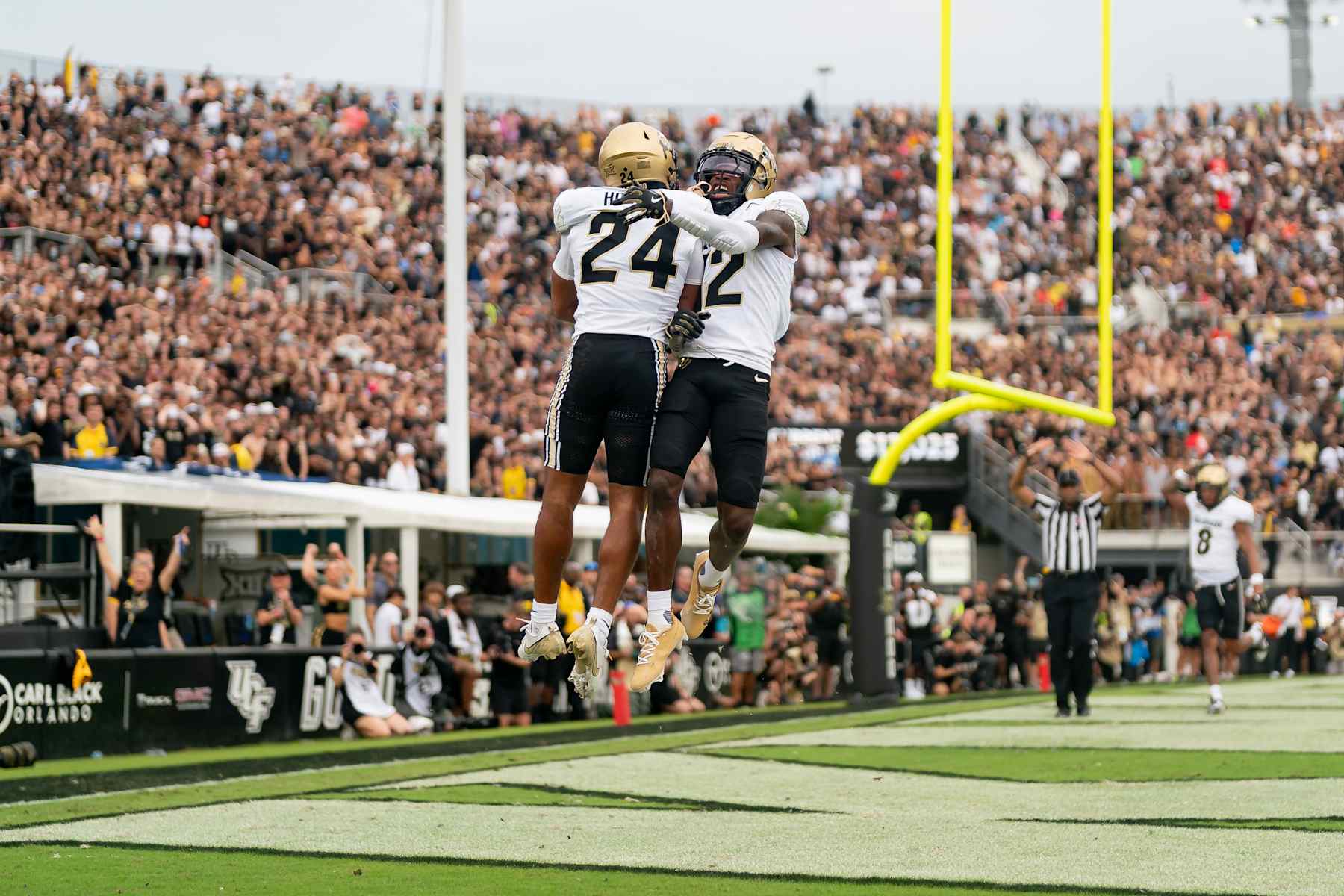 ORLANDO, FL - SEPTEMBER 28:  Colorado Buffaloes cornerback Preston Hodge (24) and Colorado Buffaloes wide receiver Travis Hunter (12) celebrate an interception during a college football game between the Colorado Buffaloes and the UCF Knights on September 28th, 2024 at FBC Mortgage Stadium in Orlando, FL. (Photo by Chris Leduc/Icon Sportswire via Getty Images)