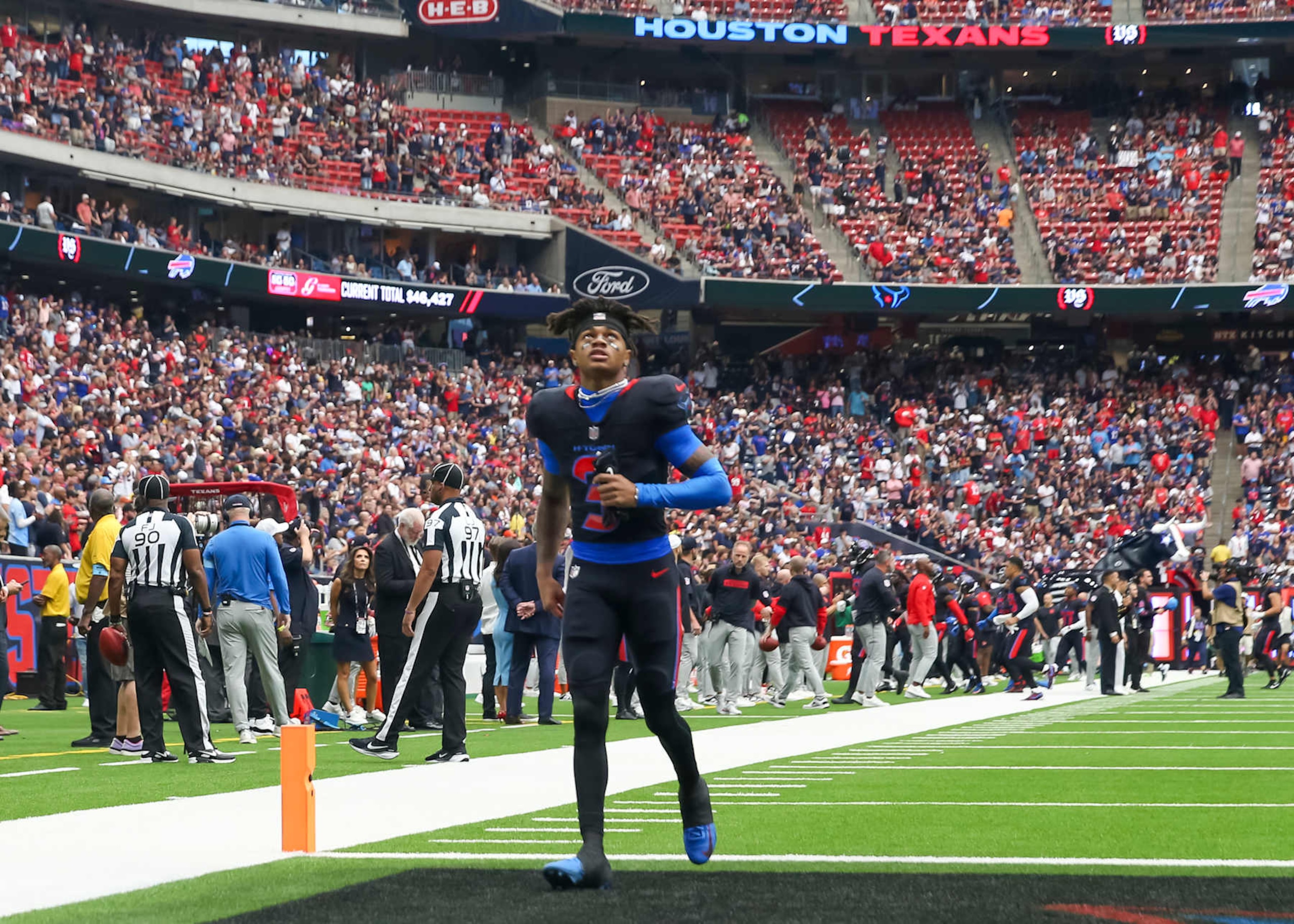 HOUSTON, TX - OCTOBER 06:  Houston Texans wide receiver Tank Dell (3) approaches the end zone to say a prayer before the beginning the NFL game between the Buffalo Bills and Houston Texans on October 6, 2024 at NRG Stadium in Houston, Texas.  (Photo by Leslie Plaza Johnson/Icon Sportswire via Getty Images)