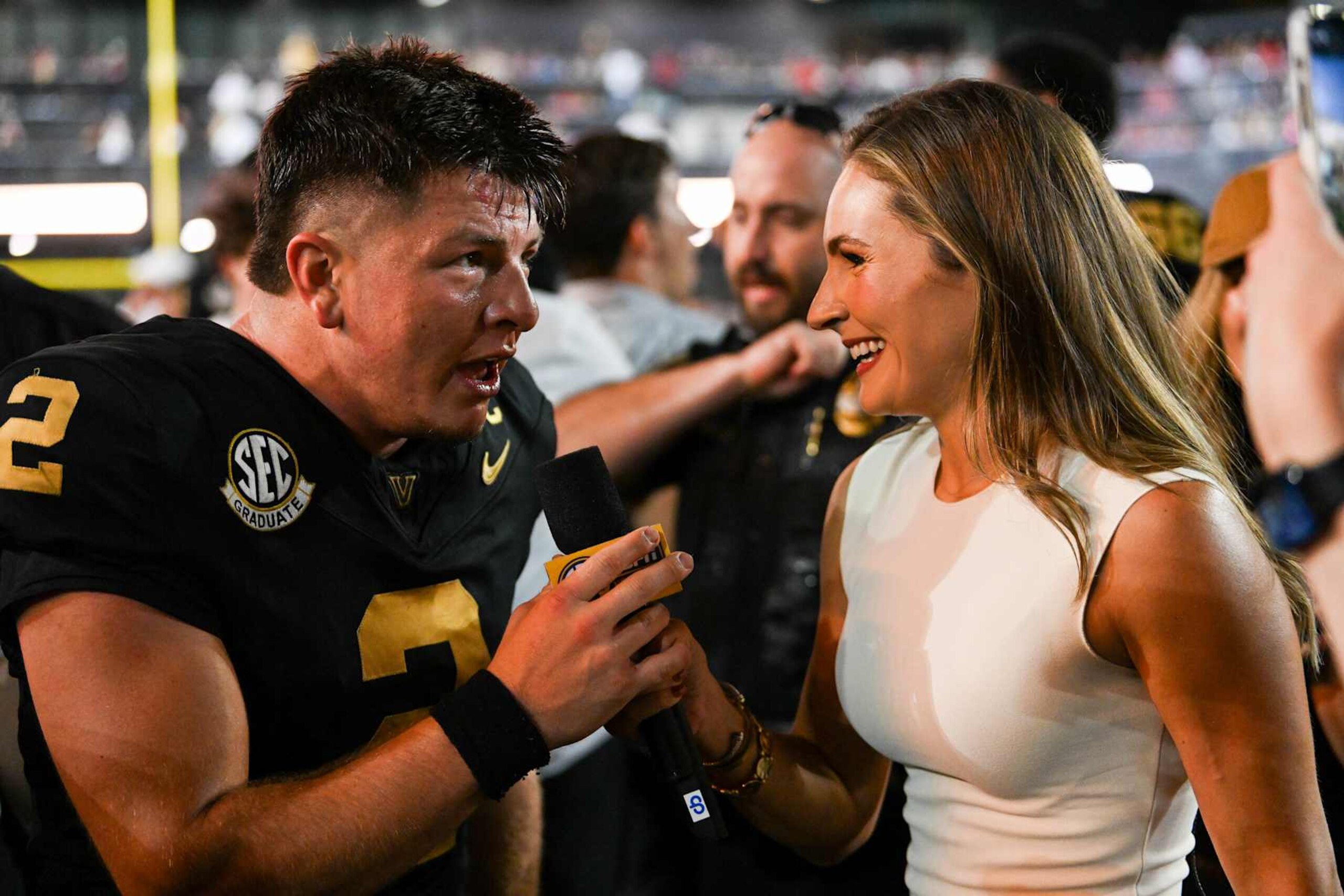NASHVILLE, TENNESSEE - OCTOBER 5: Diego Pavia #2 of the Vanderbilt Commodores is interviewed by Alyssa Lang after his win against the Alabama Crimson Tide at FirstBank Stadium on October 5, 2024 in Nashville, Tennessee. (Photo by Carly Mackler/Getty Images) NASHVILLE, TENNESSEE - OCTOBER 5: Diego Pavia #2 of the Vanderbilt Commodores is interviewed by Alyssa Lang after his win against the Alabama Crimson Tide at FirstBank Stadium on October 5, 2024 in Nashville, Tennessee. (Photo by Carly Mackler/Getty Images)