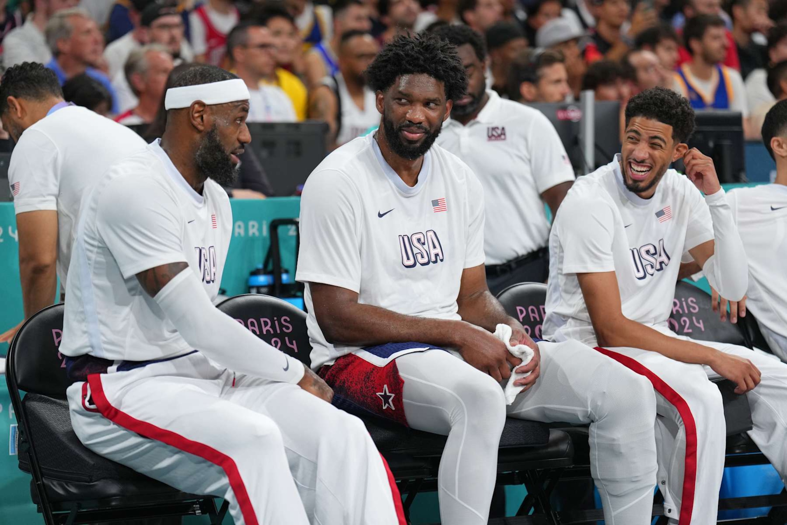 LILLE, FRANCE - AUGUST 3: LeBron James #6, Joel Embiid #11 and Tyrese Haliburton #9 of the USA Men's National Team looks on during the game at the Stade Pierre Mauroy on August 3, 2024 in Lille, France. NOTE TO USER: User expressly acknowledges and agrees that, by downloading and/or using this photograph, user is consenting to the terms and conditions of the Getty Images License Agreement. Mandatory Copyright Notice: Copyright 2024 NBAE (Photo by Jesse D. Garrabrant/NBAE via Getty Images) LILLE, FRANCE - AUGUST 3: LeBron James #6, Joel Embiid #11 and Tyrese Haliburton #9 of the USA Men's National Team looks on during the game at the Stade Pierre Mauroy on August 3, 2024 in Lille, France. NOTE TO USER: User expressly acknowledges and agrees that, by downloading and/or using this photograph, user is consenting to the terms and conditions of the Getty Images License Agreement. Mandatory Copyright Notice: Copyright 2024 NBAE (Photo by Jesse D. Garrabrant/NBAE via Getty Images)