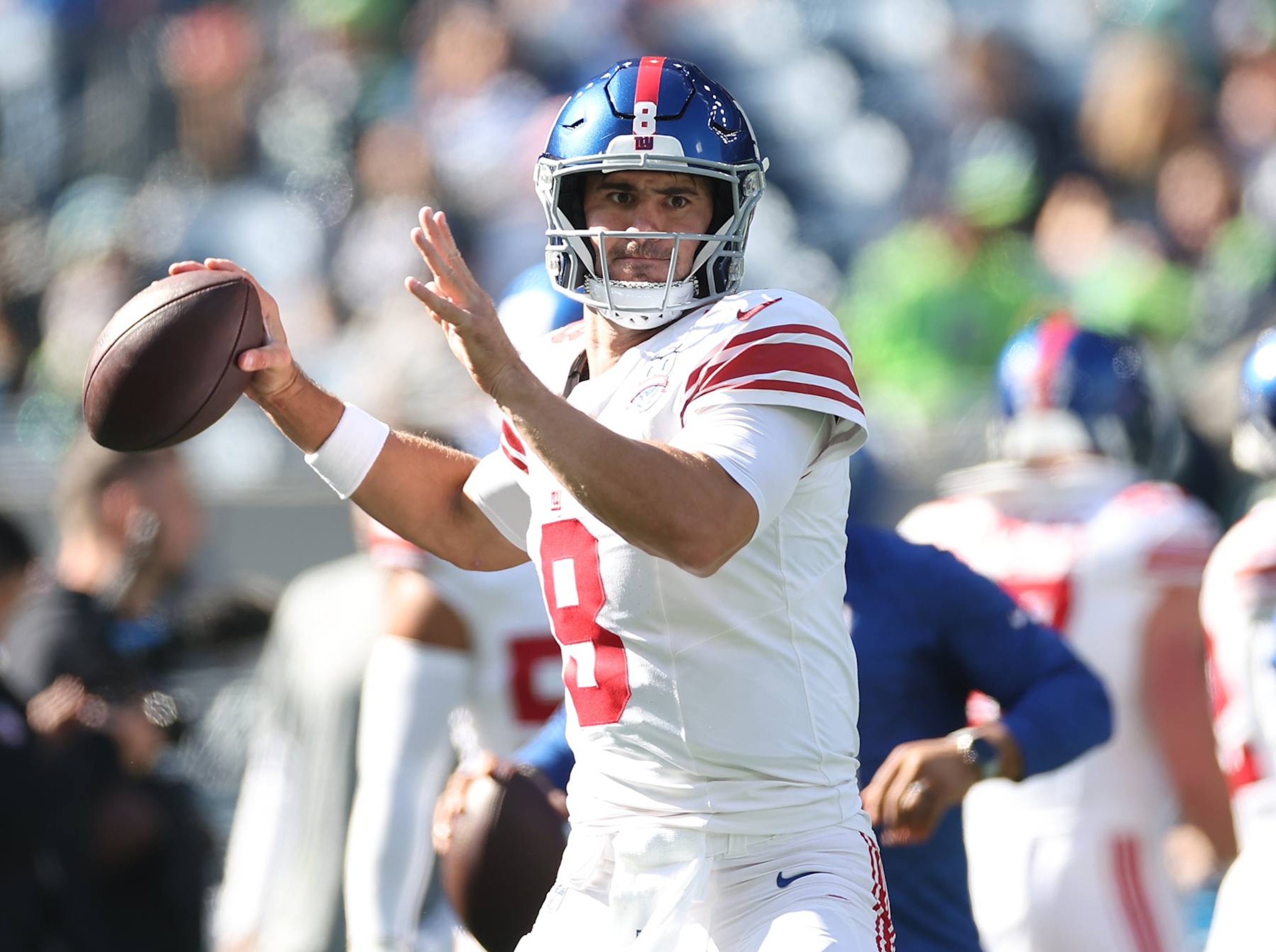SEATTLE, WASHINGTON - OCTOBER 06: Quarterback Daniel Jones #8 of the New York Giants looks to pass during the first half of a game against the Seattle Seahawks at Lumen Field on October 06, 2024 in Seattle, Washington. (Photo by Steph Chambers/Getty Images)
