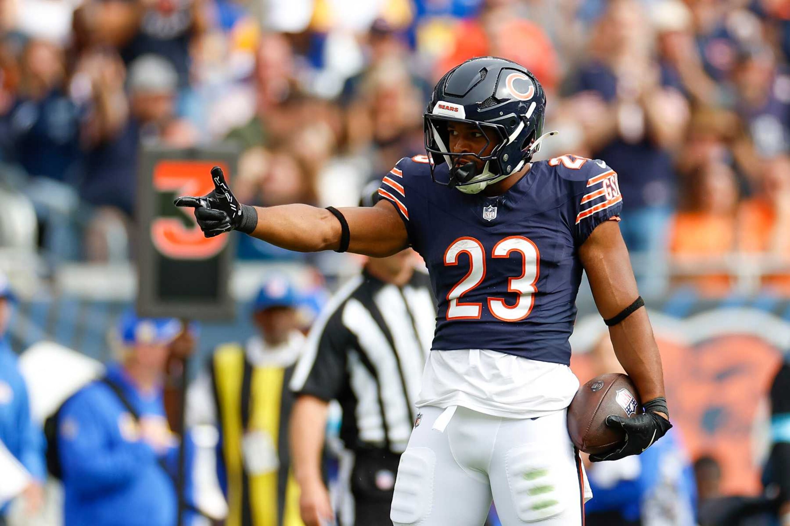 CHICAGO, ILLINOIS - SEPTEMBER 29: Roschon Johnson #23 of the Chicago Bears celebrates during the second half against the Los Angeles Rams at Soldier Field on September 29, 2024 in Chicago, Illinois. (Photo by Brandon Sloter/Getty Images)