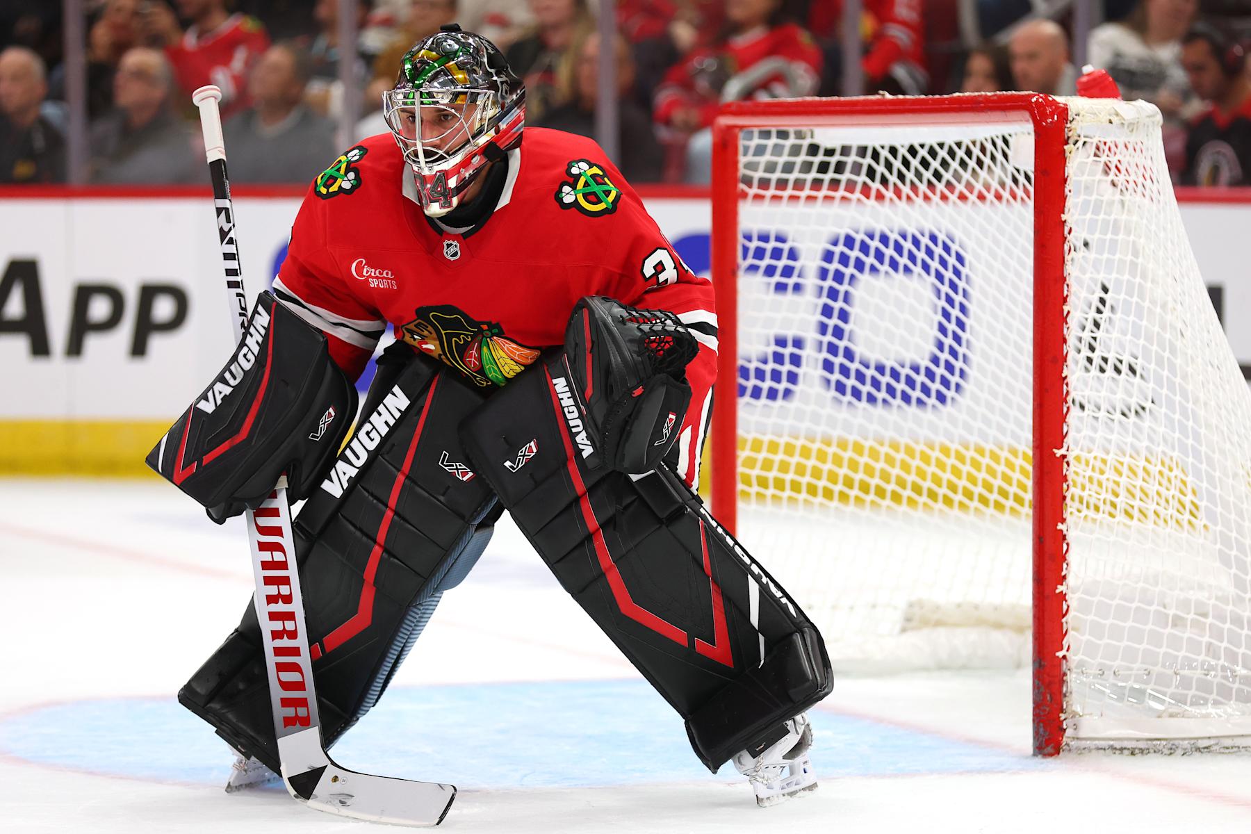 CHICAGO, ILLINOIS - OCTOBER 04: Petr Mrazek #34 of the Chicago Blackhawks tends the net against the Minnesota Wild during the first period of a preseason game at the United Center on October 04, 2024 in Chicago, Illinois. (Photo by Michael Reaves/Getty Images)