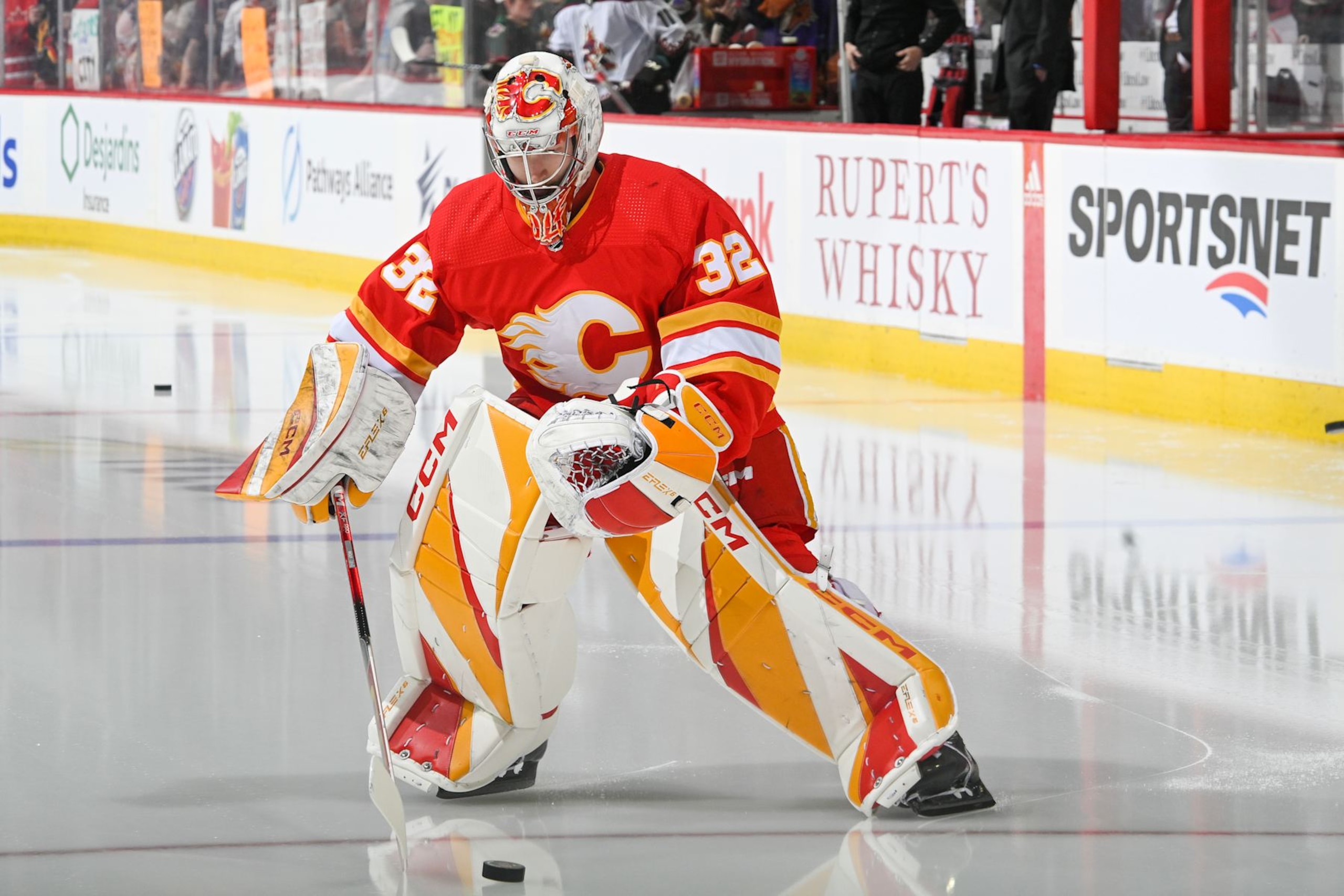 CALGARY, ALBERTA - APRIL 14: Dustin Wolf #32 of the Calgary Flames skates before the game against the Arizona Coyotes at the Scotiabank Saddledome on April 14, 2024 in Calgary, Alberta. (Photo by Terence Leung/NHLI via Getty Images)