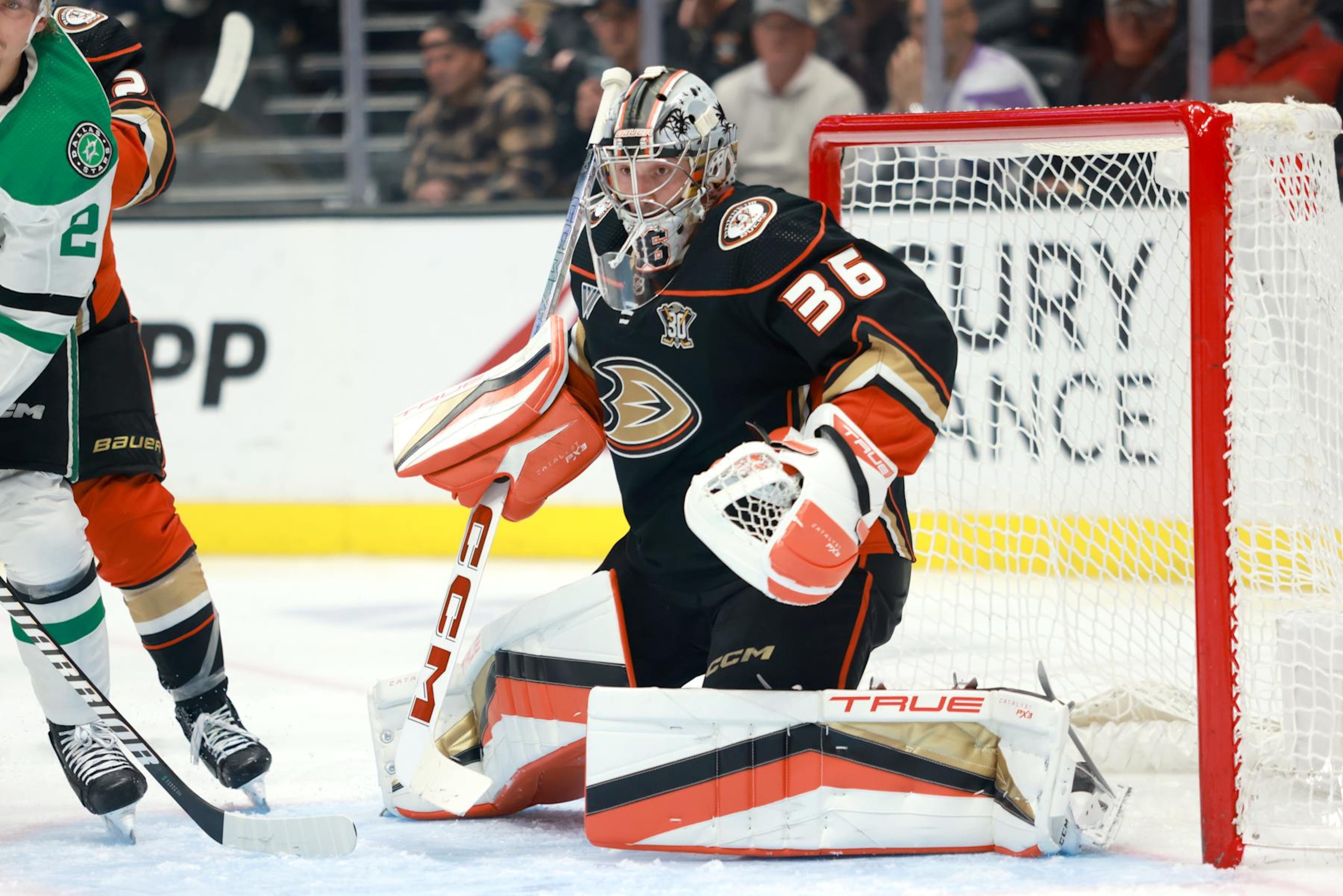 ANAHEIM, CALIFORNIA - MARCH 08: John Gibson #36 of the Anaheim Ducks defends the net in the second period during the game against the Dallas Stars at Honda Center on March 08, 2024 in Anaheim, California. (Photo by Nicole Vasquez/NHLI via Getty Images)
