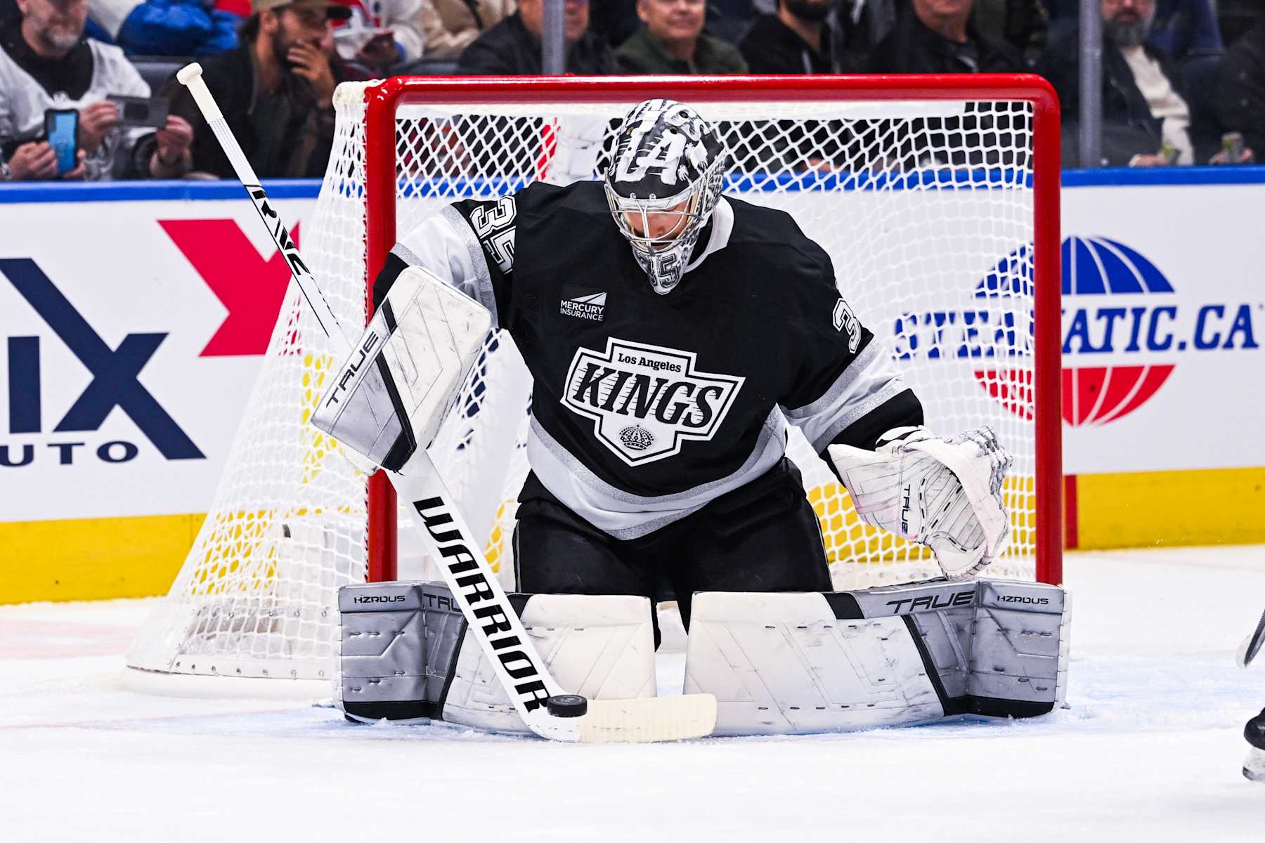 QUEBEC CITY, QC - OCTOBER 05: Los Angeles Kings goalie Darcy Kuemper (35) makes a save during the Florida Panthers versus the Los Angeles Kings preseason game on October 05, 2024, at Videotron Centre in Quebec City, QC (Photo by David Kirouac/Icon Sportswire via Getty Images)