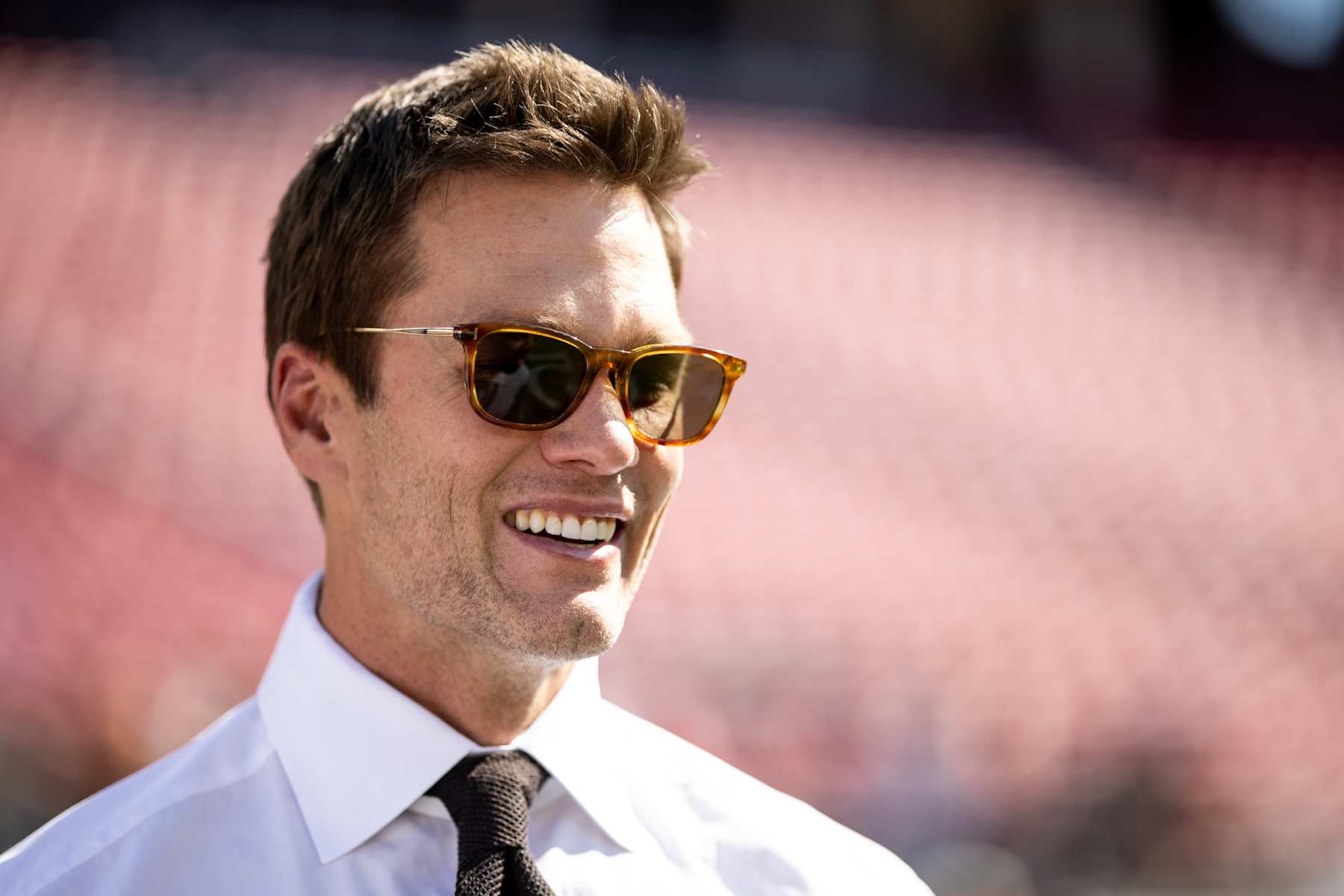 SANTA CLARA, CALIFORNIA - OCTOBER 6: Fox Sports commentator and former NFL quarterback Tom Brady reacts prior to an NFL Football game between the San Francisco 49ers and the Arizona Cardinals at Levi's Stadium on October 06, 2024 in Santa Clara, California. (Photo by Michael Owens/Getty Images) SANTA CLARA, CALIFORNIA - OCTOBER 6: Fox Sports commentator and former NFL quarterback Tom Brady reacts prior to an NFL Football game between the San Francisco 49ers and the Arizona Cardinals at Levi's Stadium on October 06, 2024 in Santa Clara, California. (Photo by Michael Owens/Getty Images)