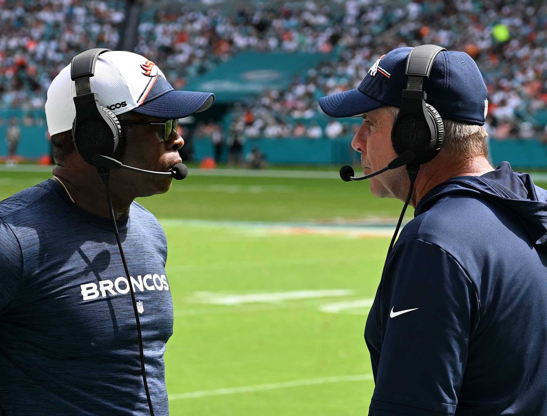 Vance Joseph, left, and Sean Payton