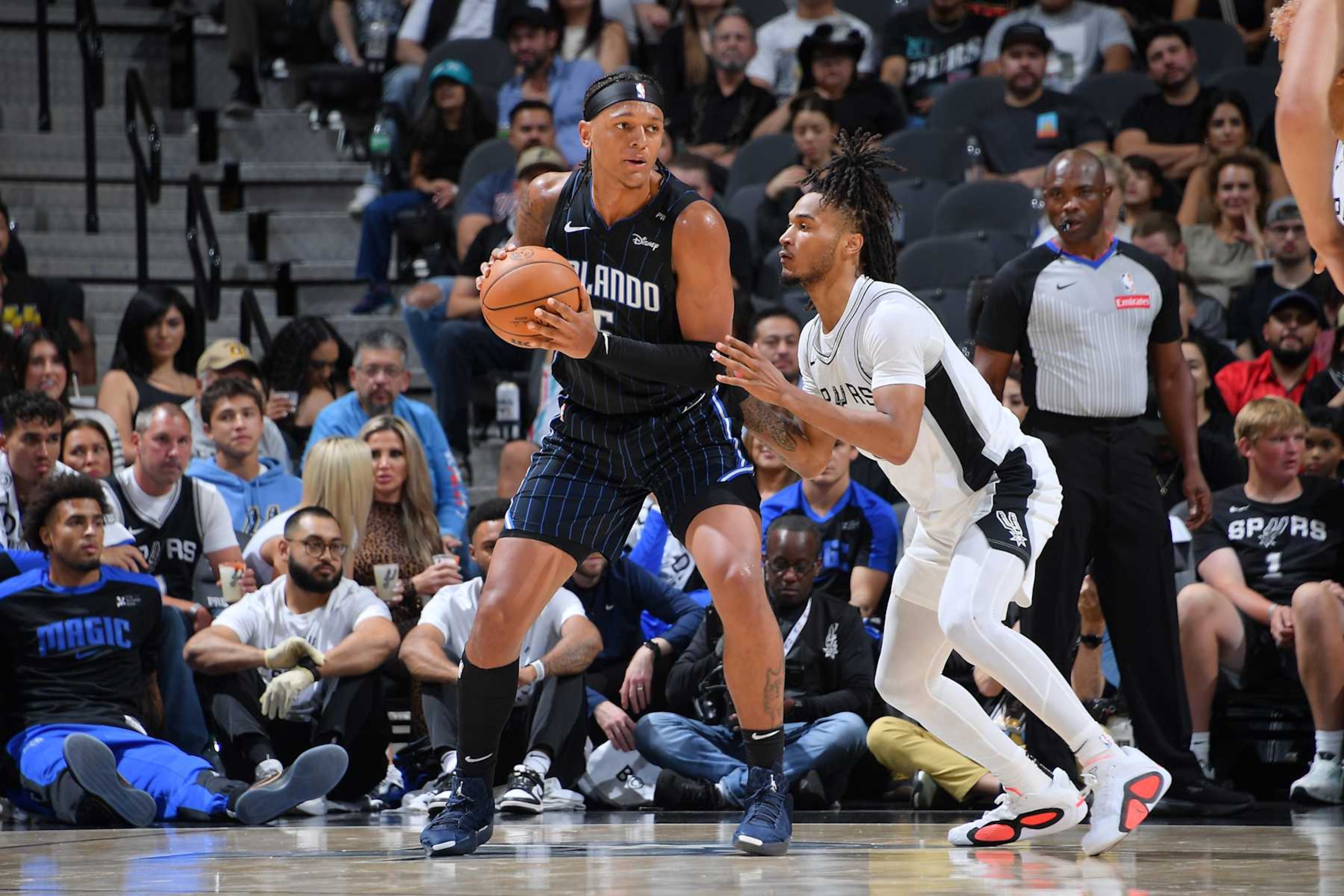 SAN ANTONIO, TX - OCTOBER 9: Paolo Banchero #5 of the Orlando Magic handles the ball during the game against the San Antonio Spurs during a NBA preseason game on October 9, 2024 at the Frost Bank Center in San Antonio, Texas. NOTE TO USER: User expressly acknowledges and agrees that, by downloading and or using this photograph, user is consenting to the terms and conditions of the Getty Images License Agreement. Mandatory Copyright Notice: Copyright 2024 NBAE (Photos by Michael Gonzales/NBAE via Getty Images)