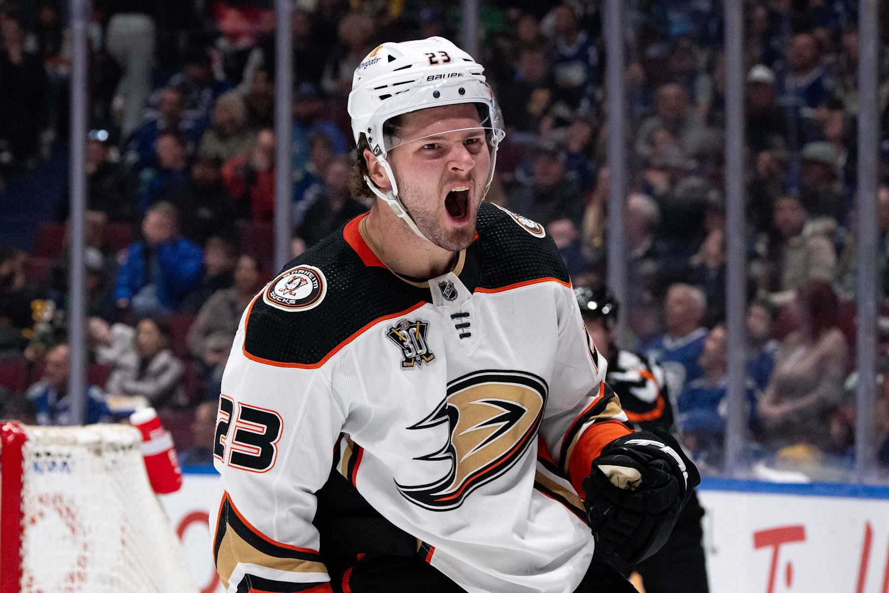 VANCOUVER, CANADA - MARCH 31: Mason McTavish #23 of the Anaheim Ducks celebrates his goal against the Vancouver Canucks during the third period of their NHL Game at Rogers Arena on March 31, 2024 in Vancouver, British Columbia, Canada. (Photo by Ethan Cairns/Getty Images)