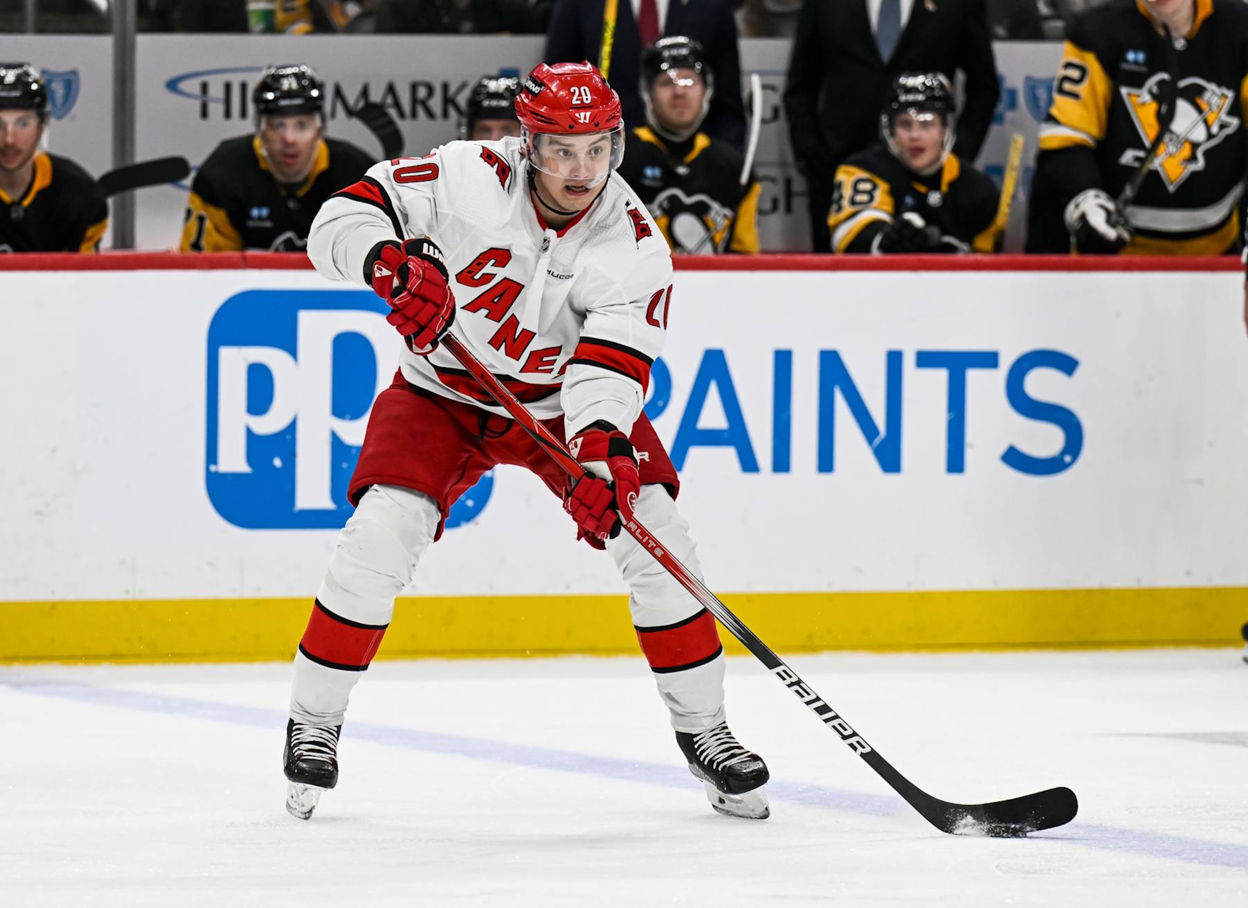 PITTSBURGH, PA - MARCH 26: Carolina Hurricanes center Sebastian Aho (20) passes the puck during the third period in the NHL game between the Pittsburgh Penguins and the Carolina Hurricanes on March 26, 2024, at PPG Paints Arena in Pittsburgh, PA. (Photo by Jeanine Leech/Icon Sportswire via Getty Images) PITTSBURGH, PA - MARCH 26: Carolina Hurricanes center Sebastian Aho (20) passes the puck during the third period in the NHL game between the Pittsburgh Penguins and the Carolina Hurricanes on March 26, 2024, at PPG Paints Arena in Pittsburgh, PA. (Photo by Jeanine Leech/Icon Sportswire via Getty Images)