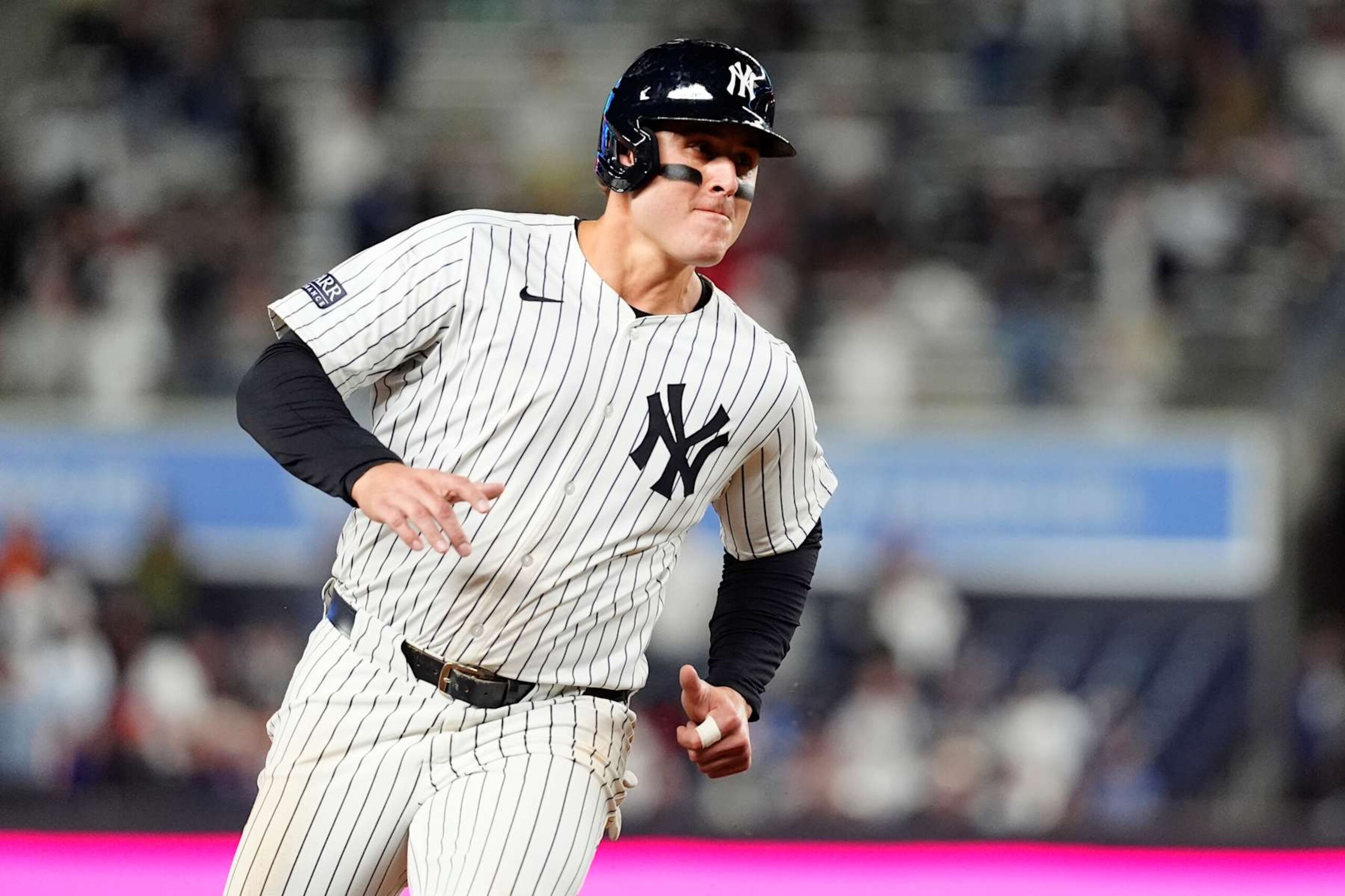 BRONX, NY - SEPTEMBER 25: New York Yankees First Baseman Anthony Rizzo (48) rounds third base and scores a run on New York Yankees Right Fielder Juan Soto (not pictured) RBI single during the ninth inning of the Major League Baseball game between the Baltimore Orioles and the New York Yankees on September 25, 2024, at Yankee Stadium in the Bronx, NY. (Photo by Gregory Fisher/Icon Sportswire via Getty Images)