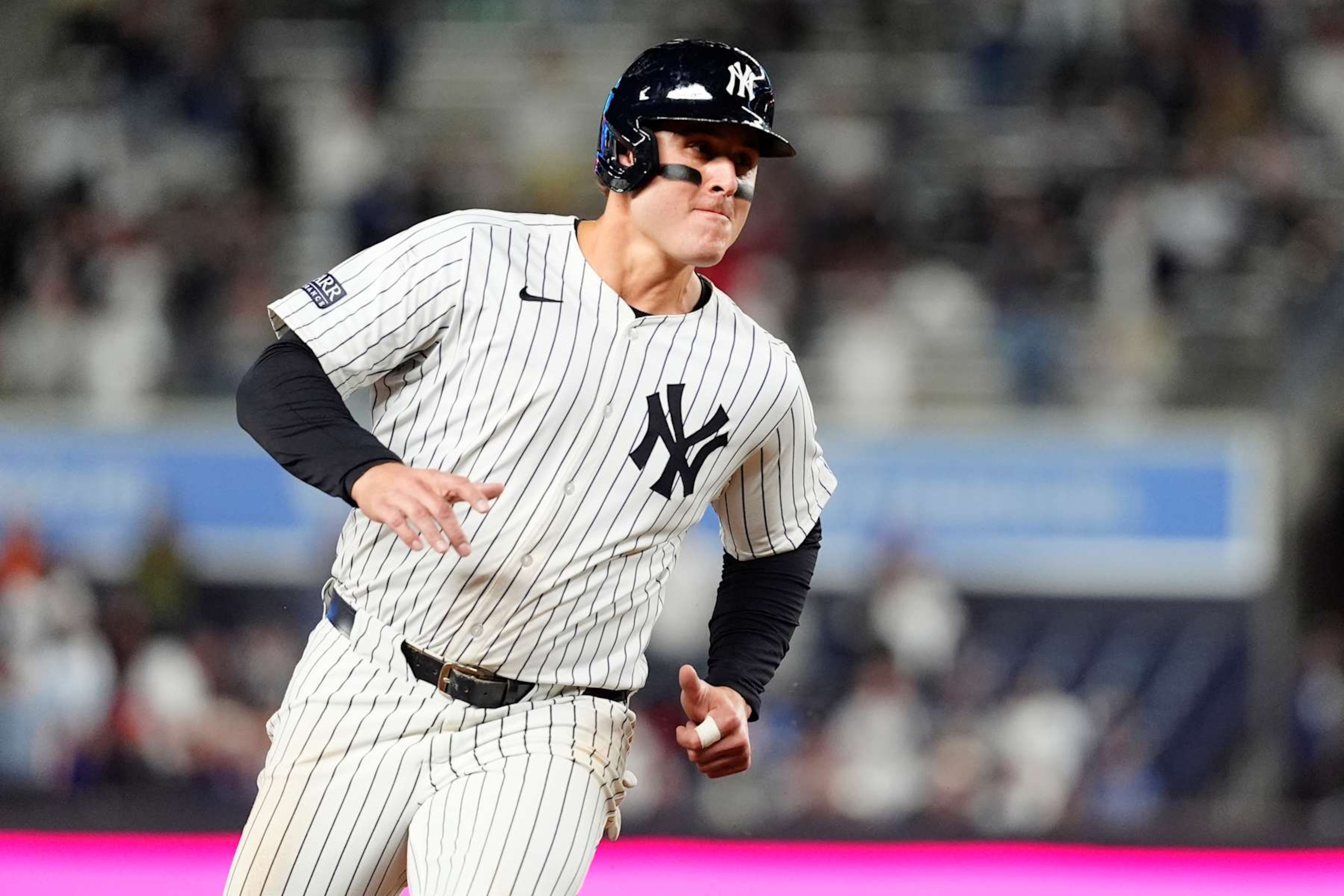 BRONX, NY - SEPTEMBER 25: New York Yankees First Baseman Anthony Rizzo (48) rounds third base and scores a run on New York Yankees Right Fielder Juan Soto (not pictured) RBI single during the ninth inning of the Major League Baseball game between the Baltimore Orioles and the New York Yankees on September 25, 2024, at Yankee Stadium in the Bronx, NY. (Photo by Gregory Fisher/Icon Sportswire via Getty Images) BRONX, NY - SEPTEMBER 25: New York Yankees First Baseman Anthony Rizzo (48) rounds third base and scores a run on New York Yankees Right Fielder Juan Soto (not pictured) RBI single during the ninth inning of the Major League Baseball game between the Baltimore Orioles and the New York Yankees on September 25, 2024, at Yankee Stadium in the Bronx, NY. (Photo by Gregory Fisher/Icon Sportswire via Getty Images)