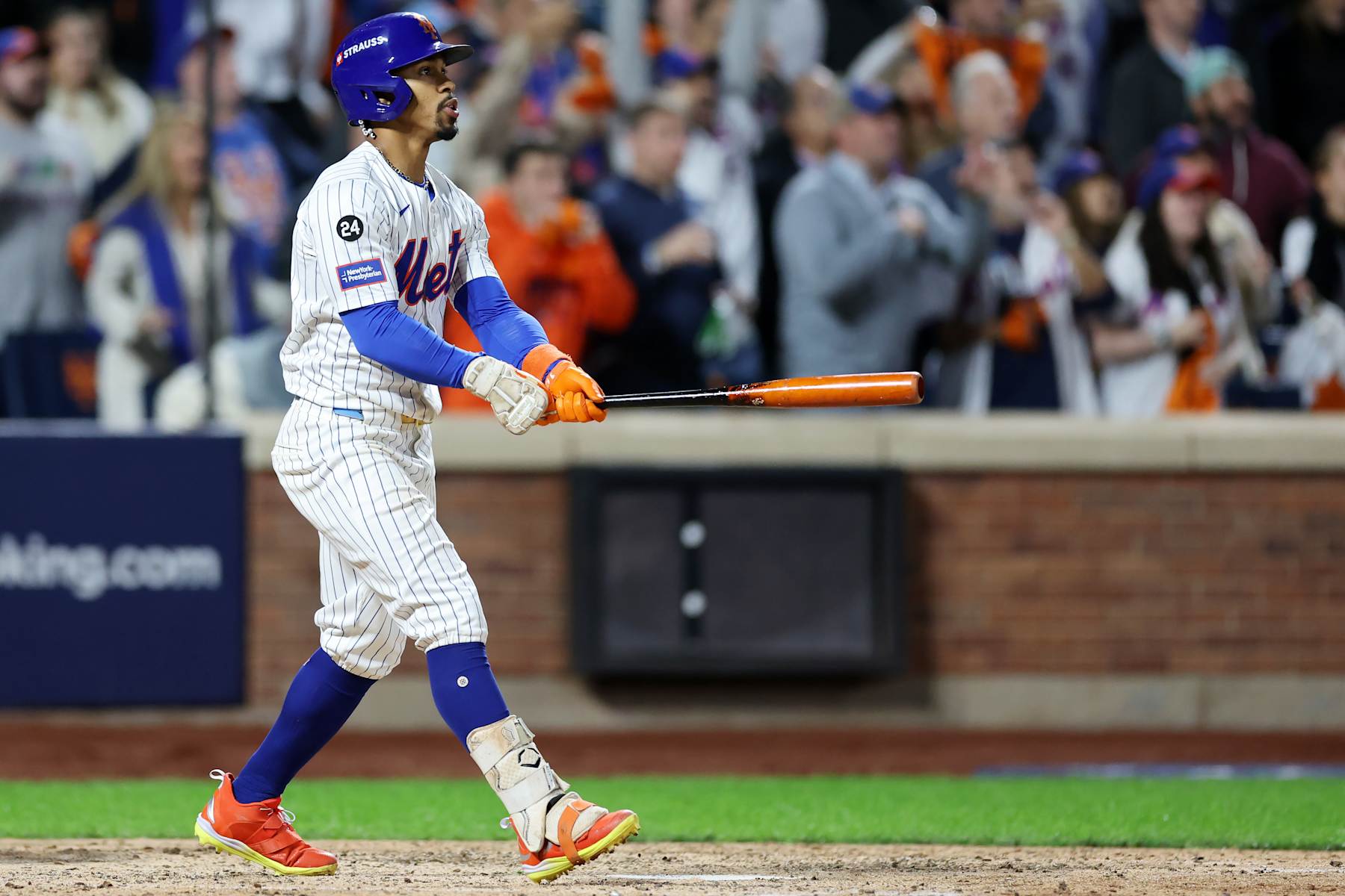 NEW YORK, NEW YORK - OCTOBER 09: Francisco Lindor #12 of the New York Mets watches his grand slam home run in the sixth inning against the Philadelphia Phillies during Game Four of the Division Series at Citi Field on October 09, 2024 in New York City. (Photo by Luke Hales/Getty Images)