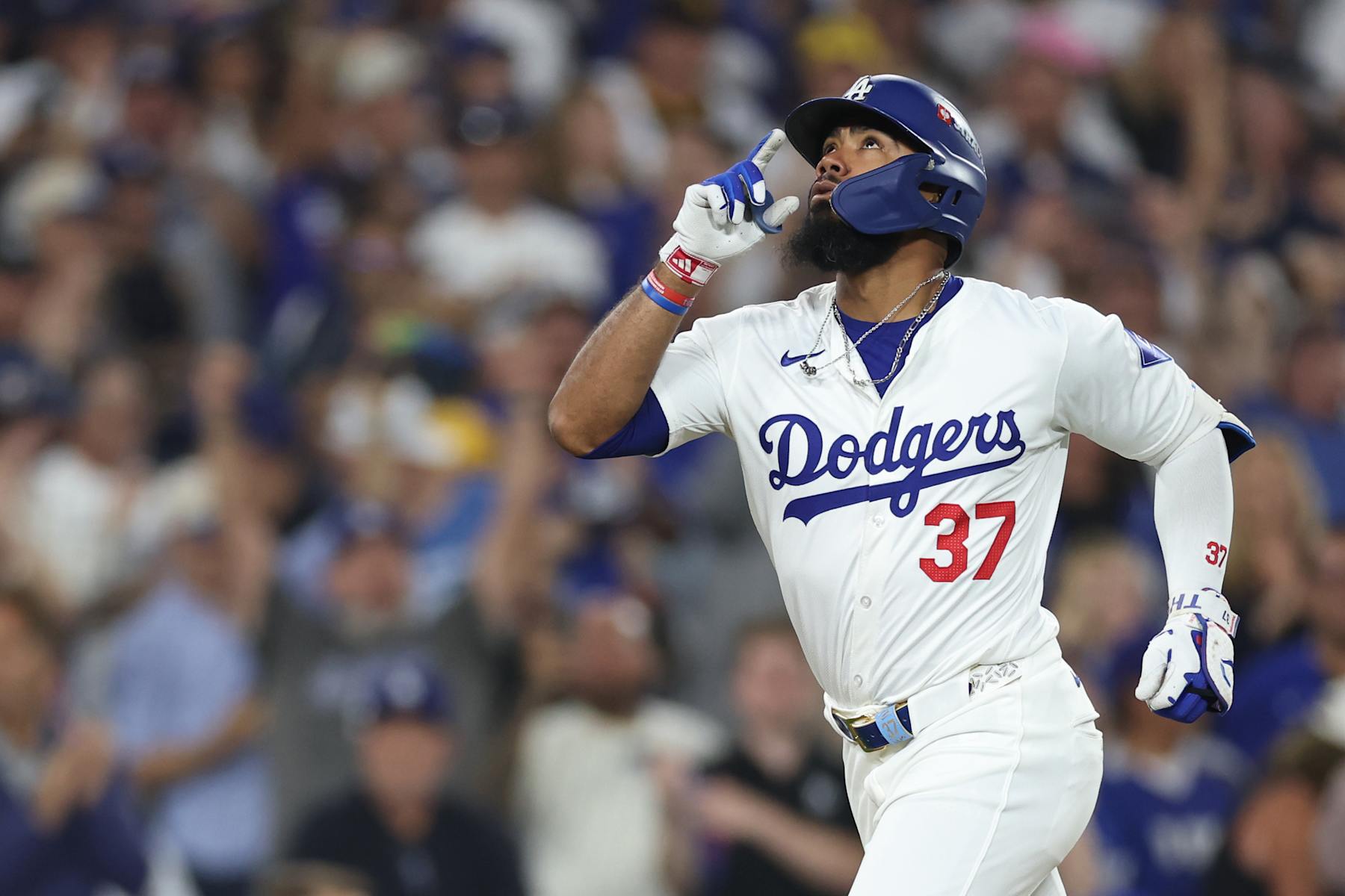 LOS ANGELES, CALIFORNIA - OCTOBER 11: Teoscar Hernández #37 of the Los Angeles Dodgers celebrates after hitting a solo home run against the San Diego Padres during the seventh inning of Game Five of the Division Series at Dodger Stadium on October 11, 2024 in Los Angeles, California.  (Photo by Sean M. Haffey/Getty Images)